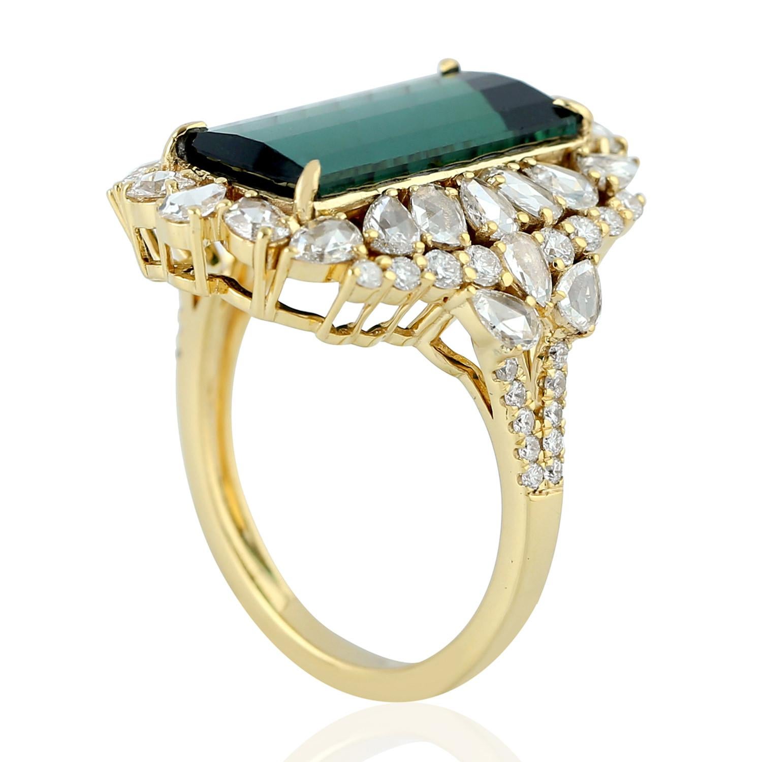 Gorgeous Green Tourmaline Ring with pear and round shape diamonds in 18K gold is perfect for wearing or gifting to your loved ones for this Holiday Season.

Ring Size : 7 (can be sized)

18KT: 5.801gms
Diamond: 1.52cts
Tourmaline: 5.82cts

