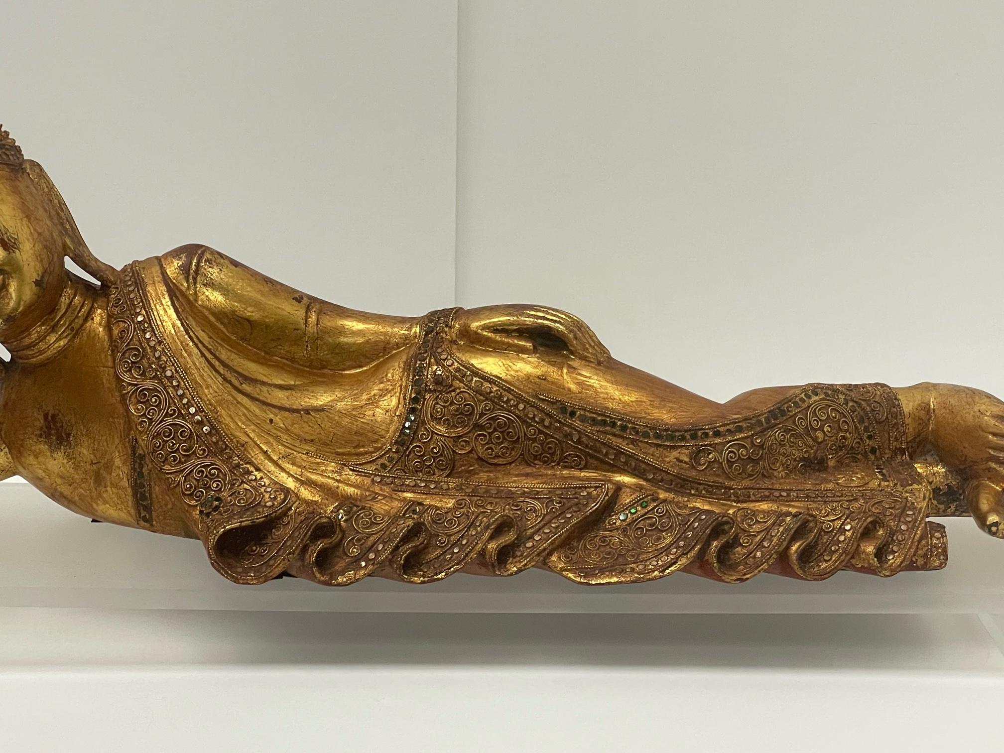 Late 20th Century Gorgeous Hand Carved Giltwood Reclining Buddha on Custom Lucite Base For Sale