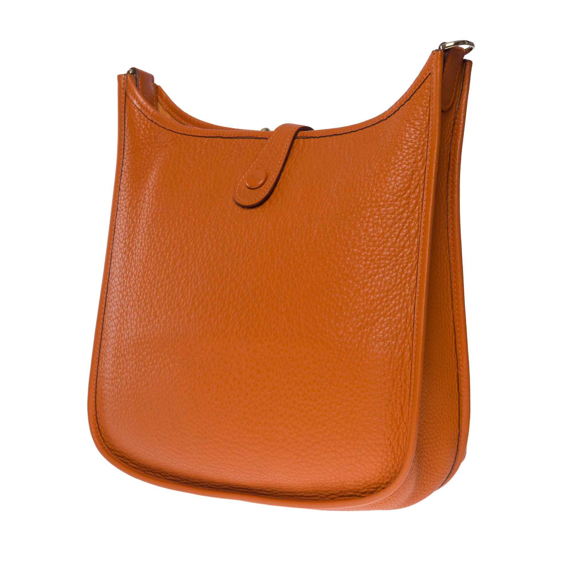 Gorgeous Hermès Evelyne 29  shoulder bag in Orange Taurillon leather, GHW In Good Condition In Paris, IDF