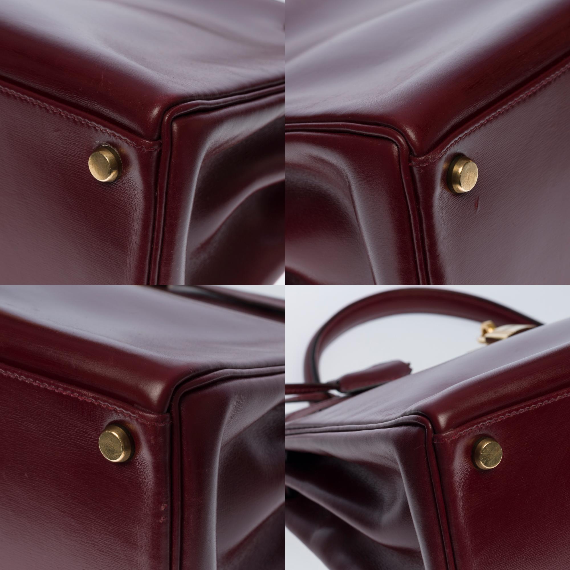 Gorgeous Hermès Kelly 32 retourne handbag strap in Burgundy Calf box leather, GHW 2