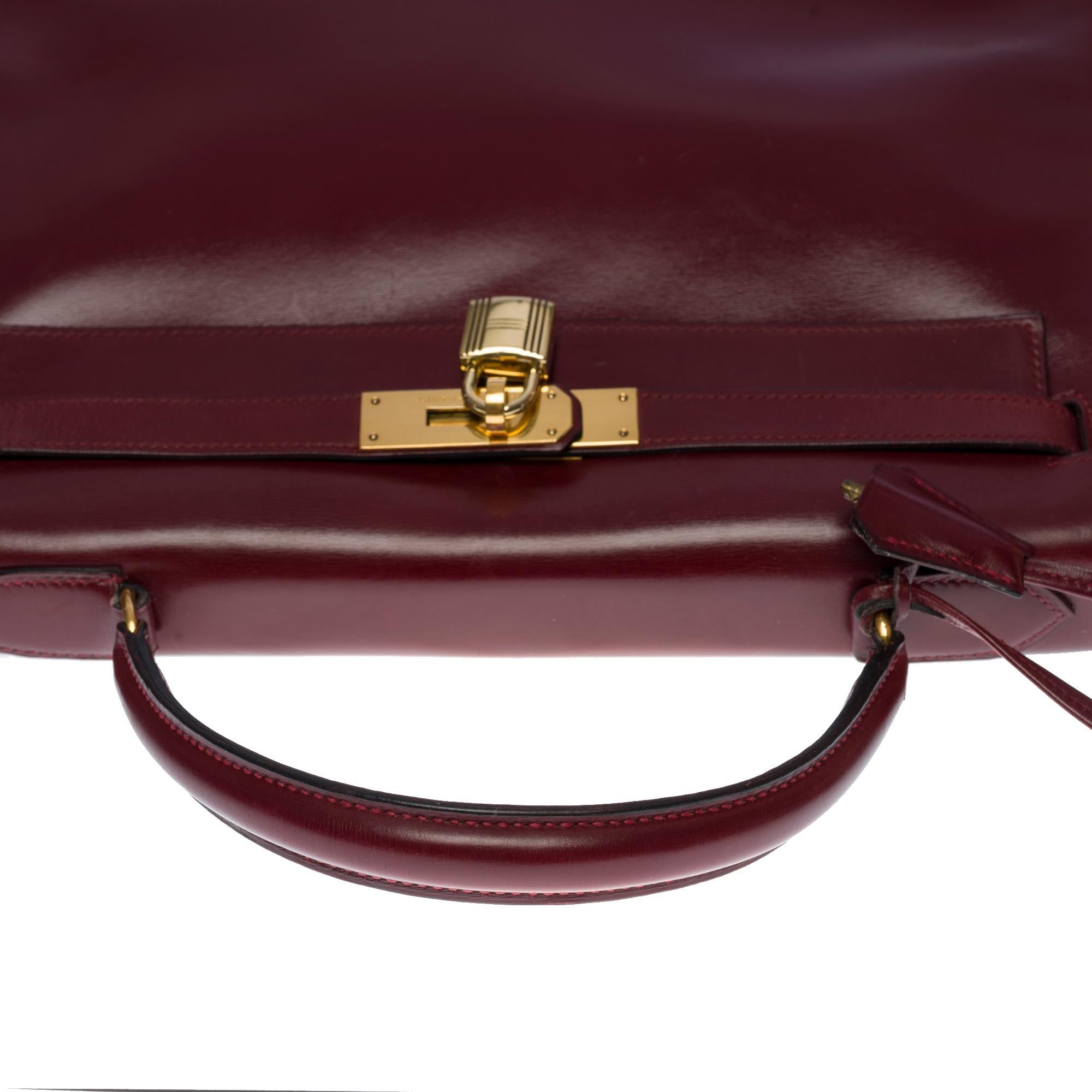 Women's or Men's Gorgeous Hermès Kelly 32 retourne handbag strap in Burgundy Calf box leather, GHW