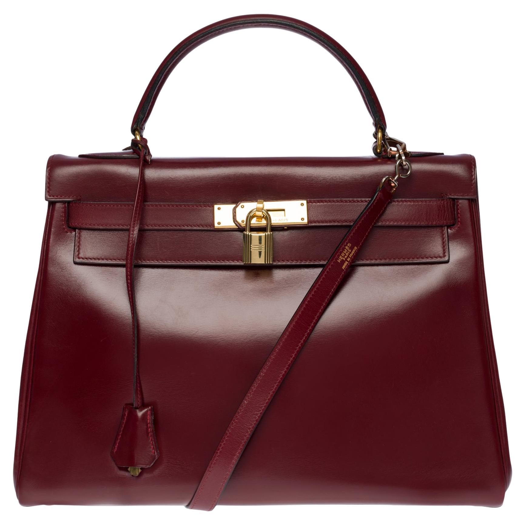 Gorgeous Hermès Kelly 32 retourne handbag strap in Burgundy Calf box leather,GHW