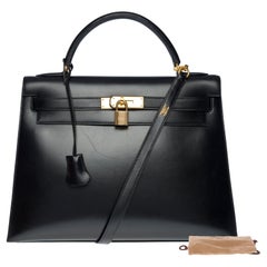 Used Gorgeous Hermès Kelly 32 sellier handbag strap in black box calf leather, GHW