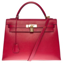 Gorgeous Hermès Kelly 32 sellier handbag strap in Red Courchevel leather, GHW