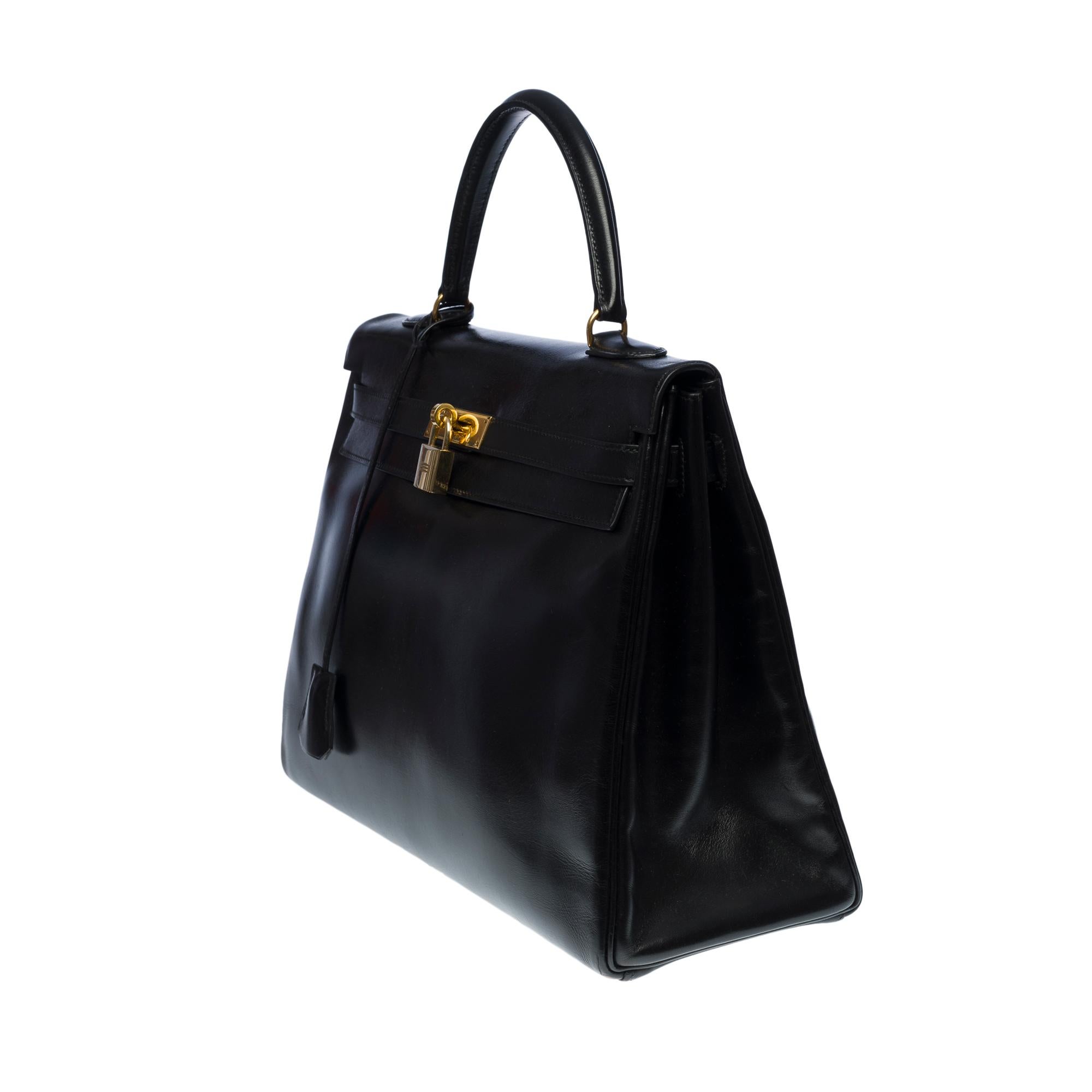 Black Gorgeous Hermès Kelly 35 retourne handbag strap in black calfskin leather, GHW