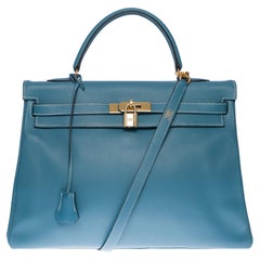 Gorgeous Hermès Kelly 35 retourné handbag strap in blue jeans Calf leather, GHW