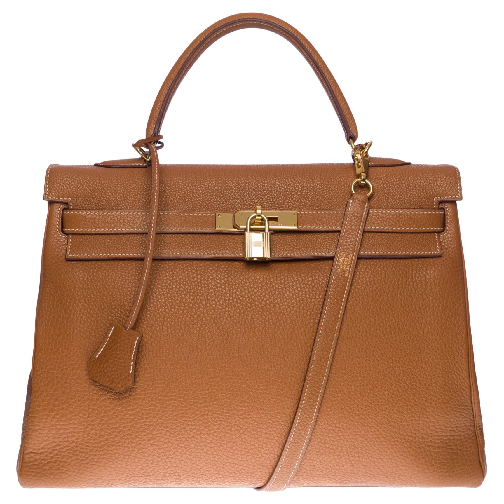 Gorgeous Hermès Kelly 35 retourné handbag strap in Gold Togo leather, GHW