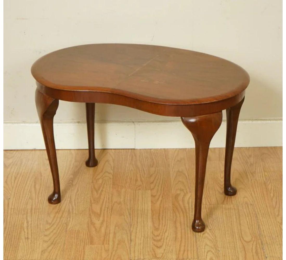 We are delighted to offer for sale this Lovely Antique Kidney Art Deco small table.

We have lightly restored this by cleaning it all over, hand waxed and polishing it.

Dimensions: 67 W x 43 D x 42 H cm

We always try to picture our items as
