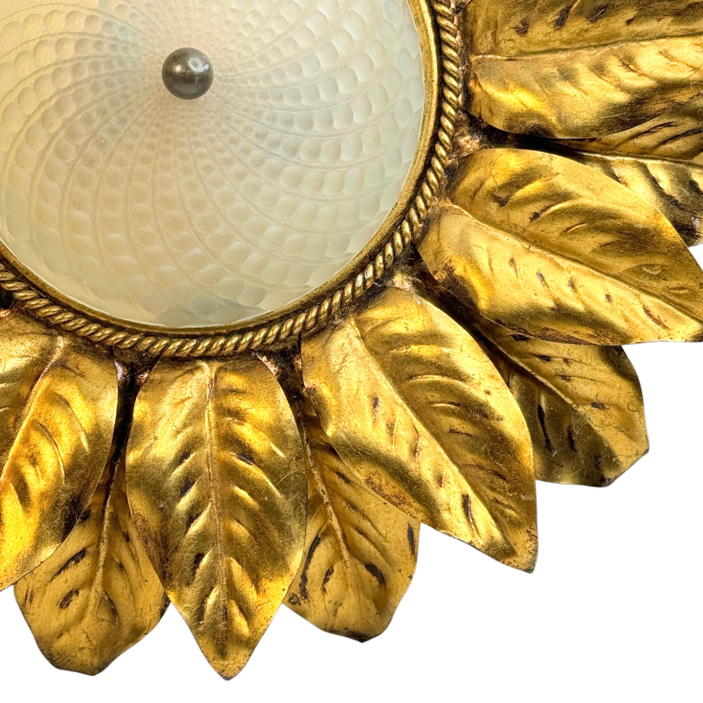 Add a touch of opulence to your home with this charming flush mount light! We'd love to see it hanging in an entryway as a charming welcome home. Built in the 1960s. The Fixture requires two European E14 / 110 Volt Candelabra bulbs, each bulb up to