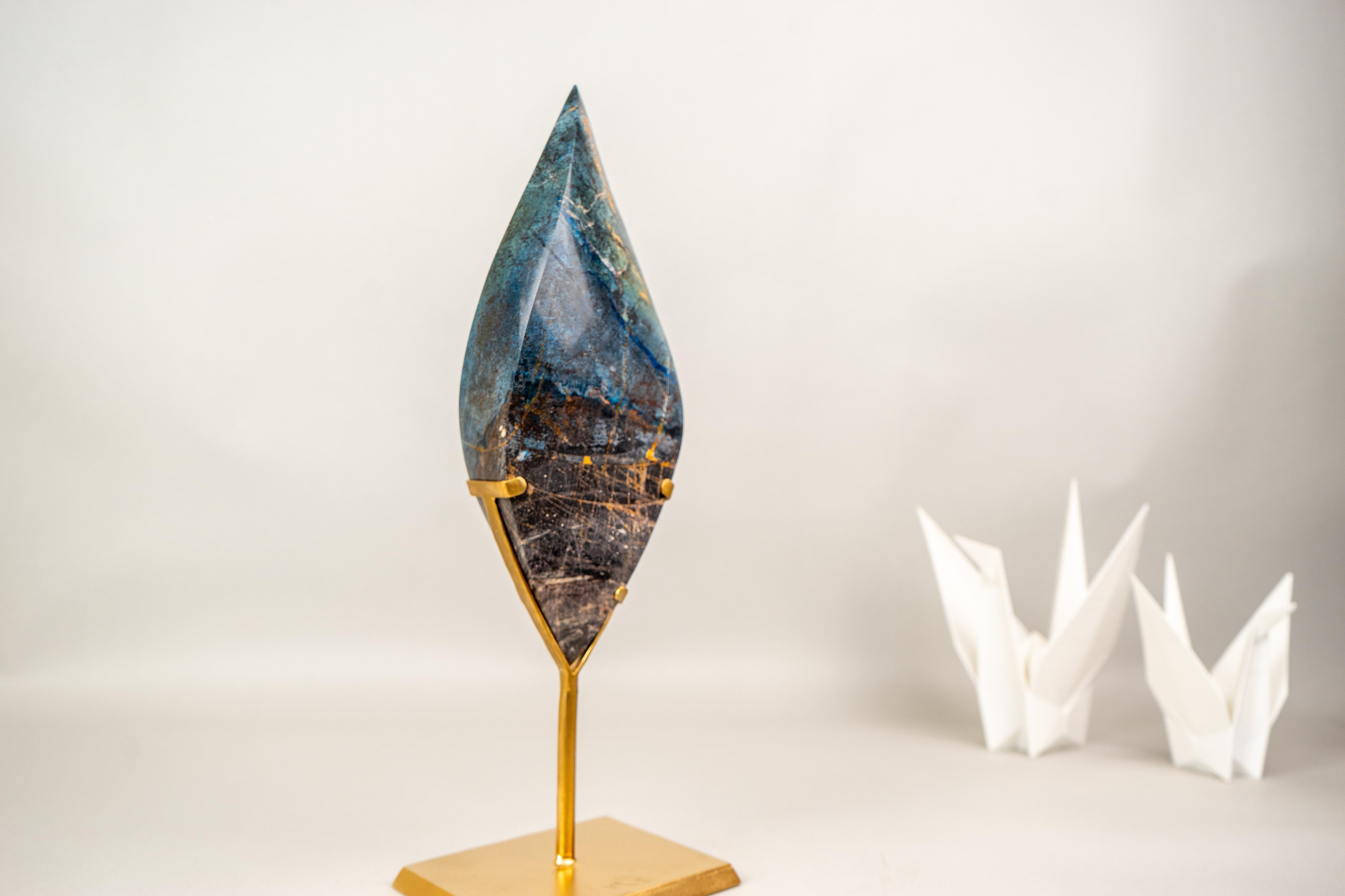 Blue Quartz Crystal Flame Sculpture – Rare Blue Rhodonite Quartz from Bahia, Brazil

▫️ Description

Hand-carved from natural Blue Rhodonite Quartz, this large crystal flame sculpture showcases a rare teal-blue color and exceptional craftsmanship.