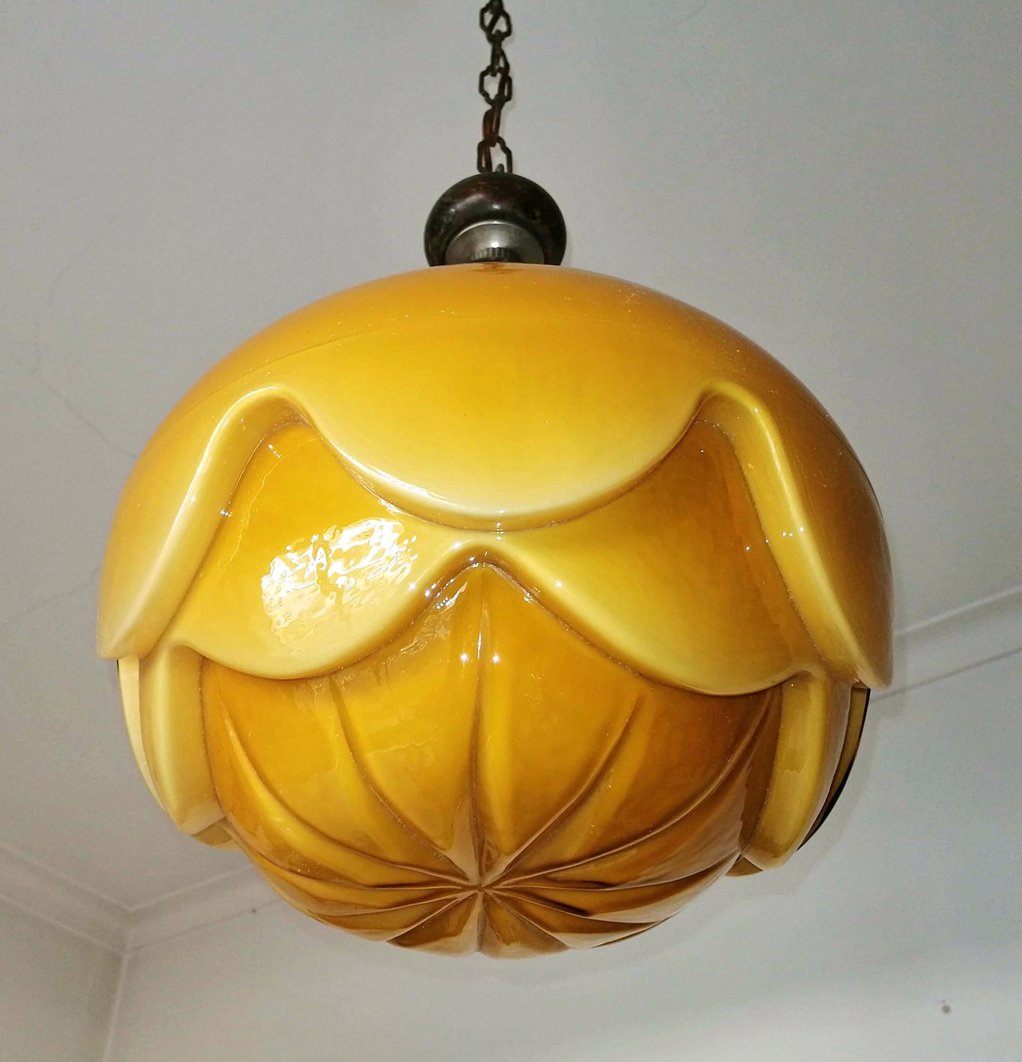 Fabulous Bauhaus French Art Deco with gorgeous opaline cased amber glass shade pendant chandelier, 1930.
Measures:
Diameter 11.8 in/ 30 cm
Height 39.3 in/ 100 cm (chain= 45 cm)
Weight: 15 lb/ 7 Kg
1 light bulbs E27/ good working