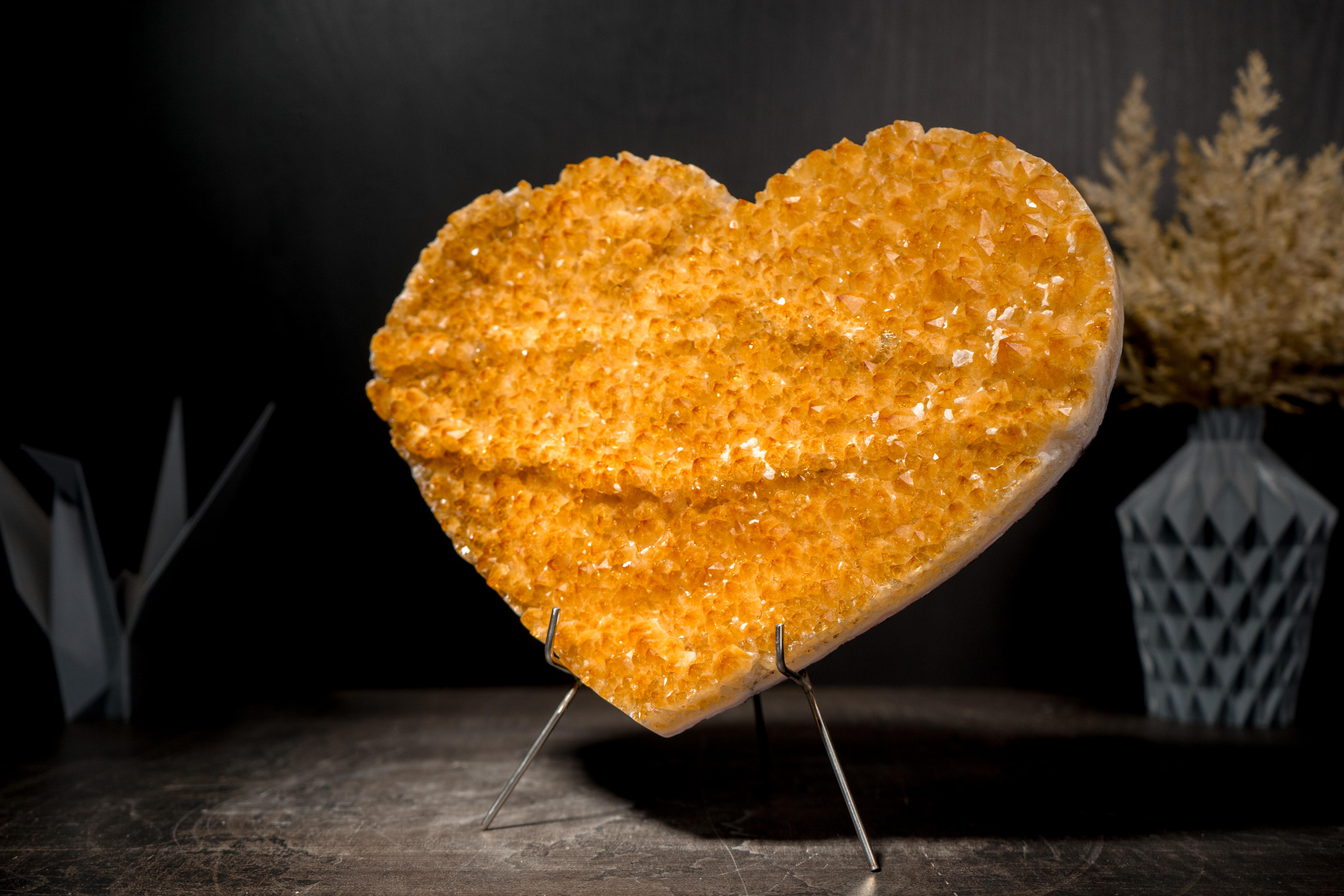 Citrine Heart with Shiny Intense Yellow Druzy with Uniquely Formation

▫️ Description

A beautiful, large, and unique Citrine Heart that boasts a mix of special qualities, such as the sparkly, intense yellow color forming what I call a “mountain