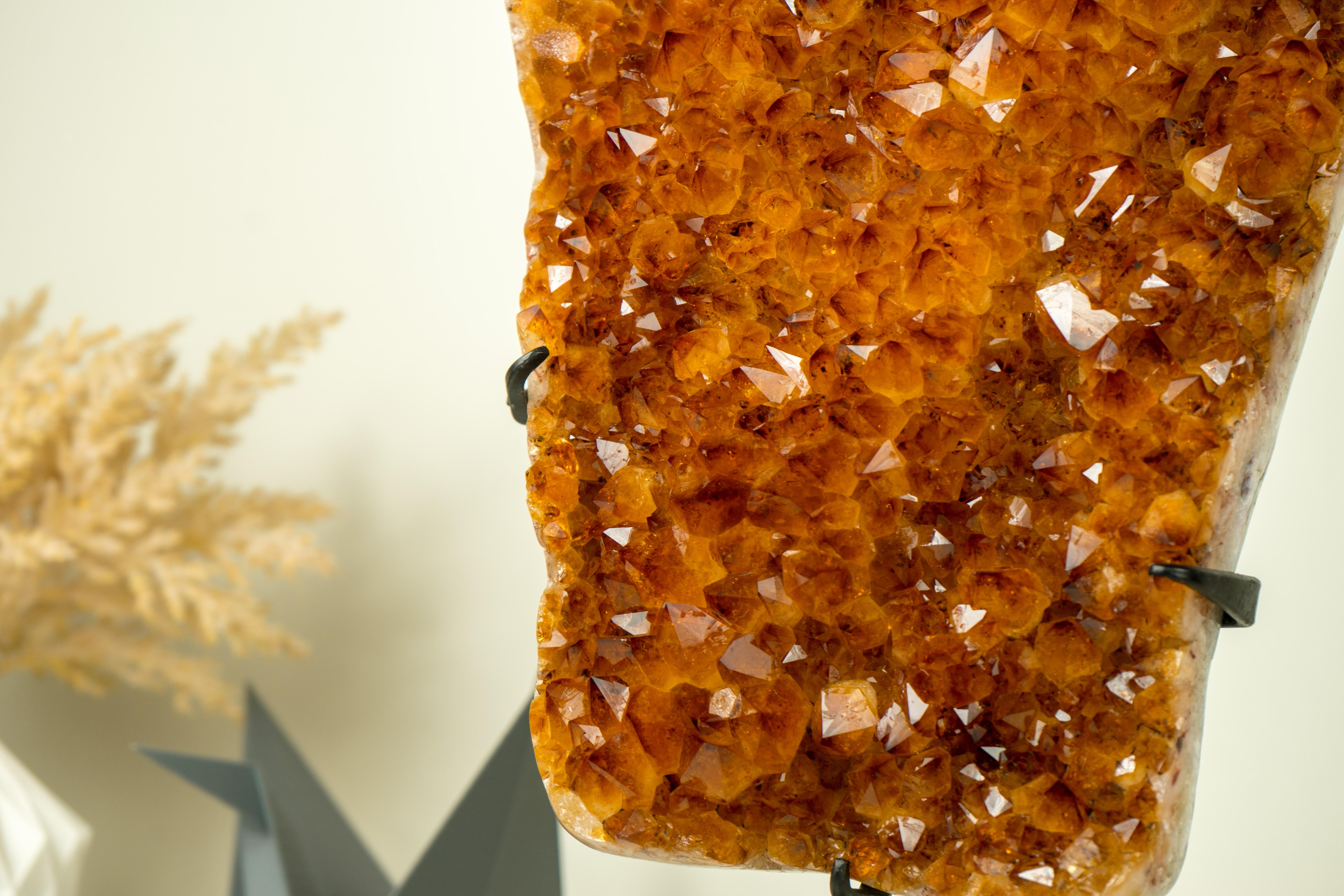 Large AAA Madeira Orange-Citrine Cluster with AAA Large Shiny Citrine Druzy 

▫️ Description

A large AAA-Grade Citrine Cluster that is a true masterpiece of nature, this cluster of Orange Madeira Citrine Points showcases gorgeous aesthetics,