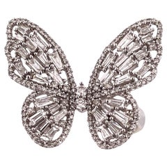 Superbe bague papillon grappe de diamants naturels en or blanc 14 carats