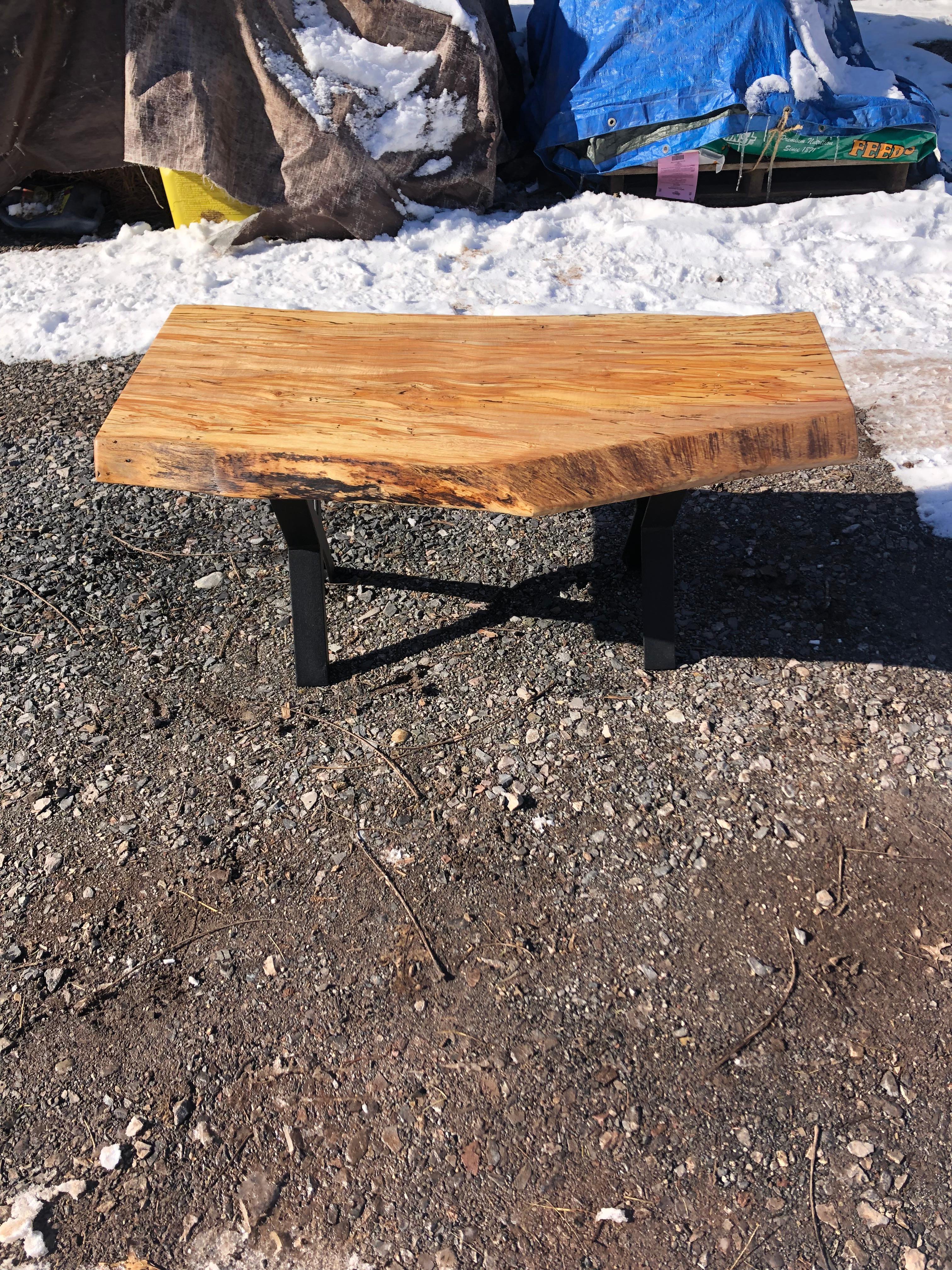 Gorgeous hand crafted maple slab live edge coffee table having marvelous grain and character. Depth from front to back varies from 20.5 to 16.5. The wood is 3