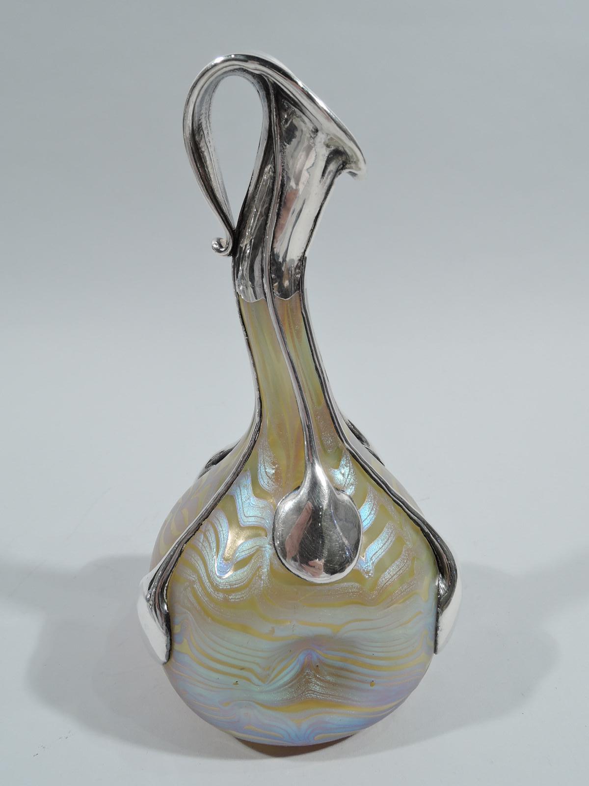 Turn-of-the-century Art Nouveau glass vase by historic maker Loetz with silver overlay. Pinched and globular bowl with curved cylindrical neck. Mouth has silver mount suggestive of a calla lily. Silver drip tendrils terminating in teardrops. Glass