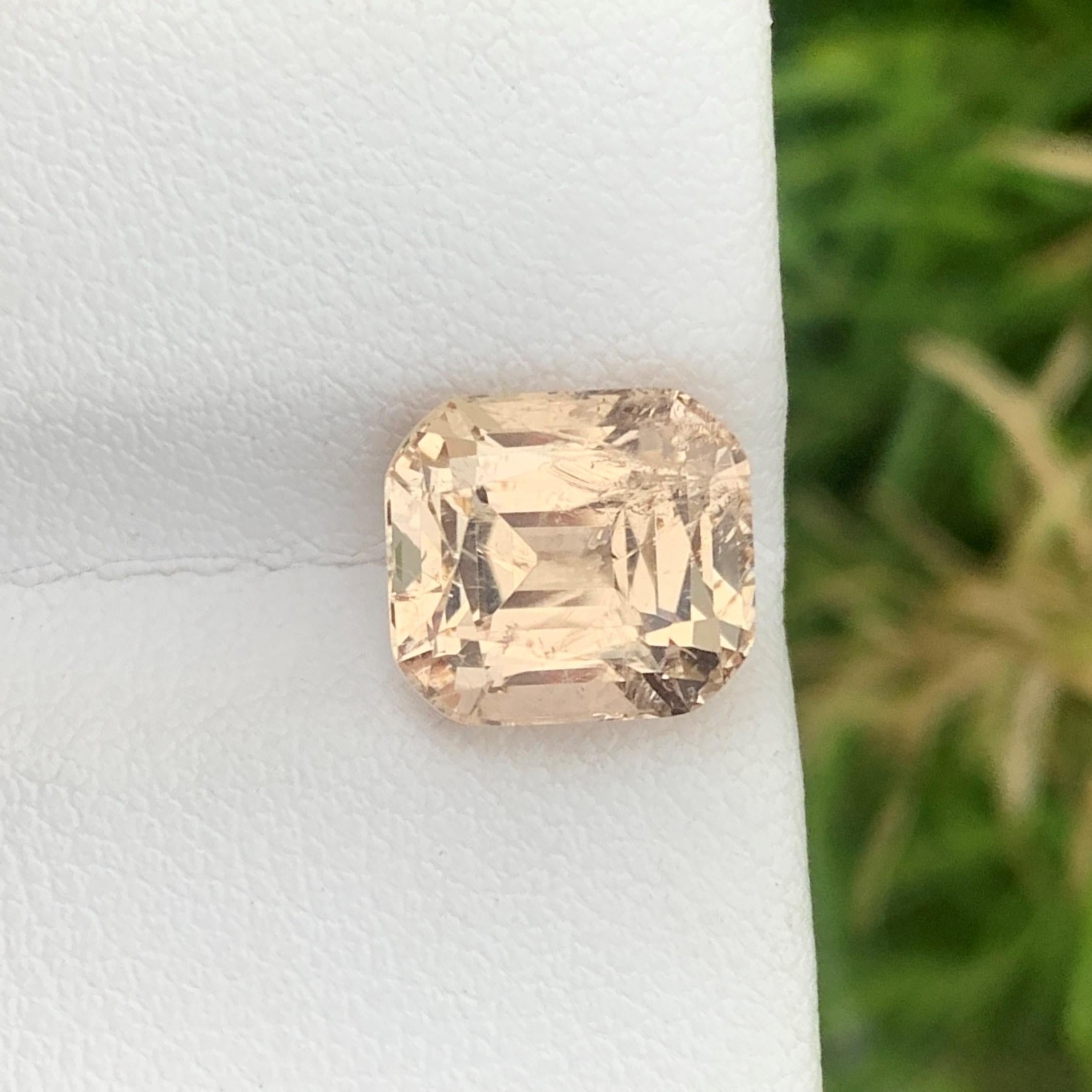 Faceted Imperial Topaz 
Weight: 5.20 Carats
Dimension: 9.7x8.7x7 Mm
Origin: Katlang Pakistan 
Shape: Cushion
Color; Peach Imperial 
Treatment: Non
Certificate: On Demand 
Imperial Topaz encourages healthy boundaries and helps us be attracted to the