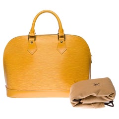Gorgeous Louis Vuitton Alma handbag in Yellow epi leather, GHW