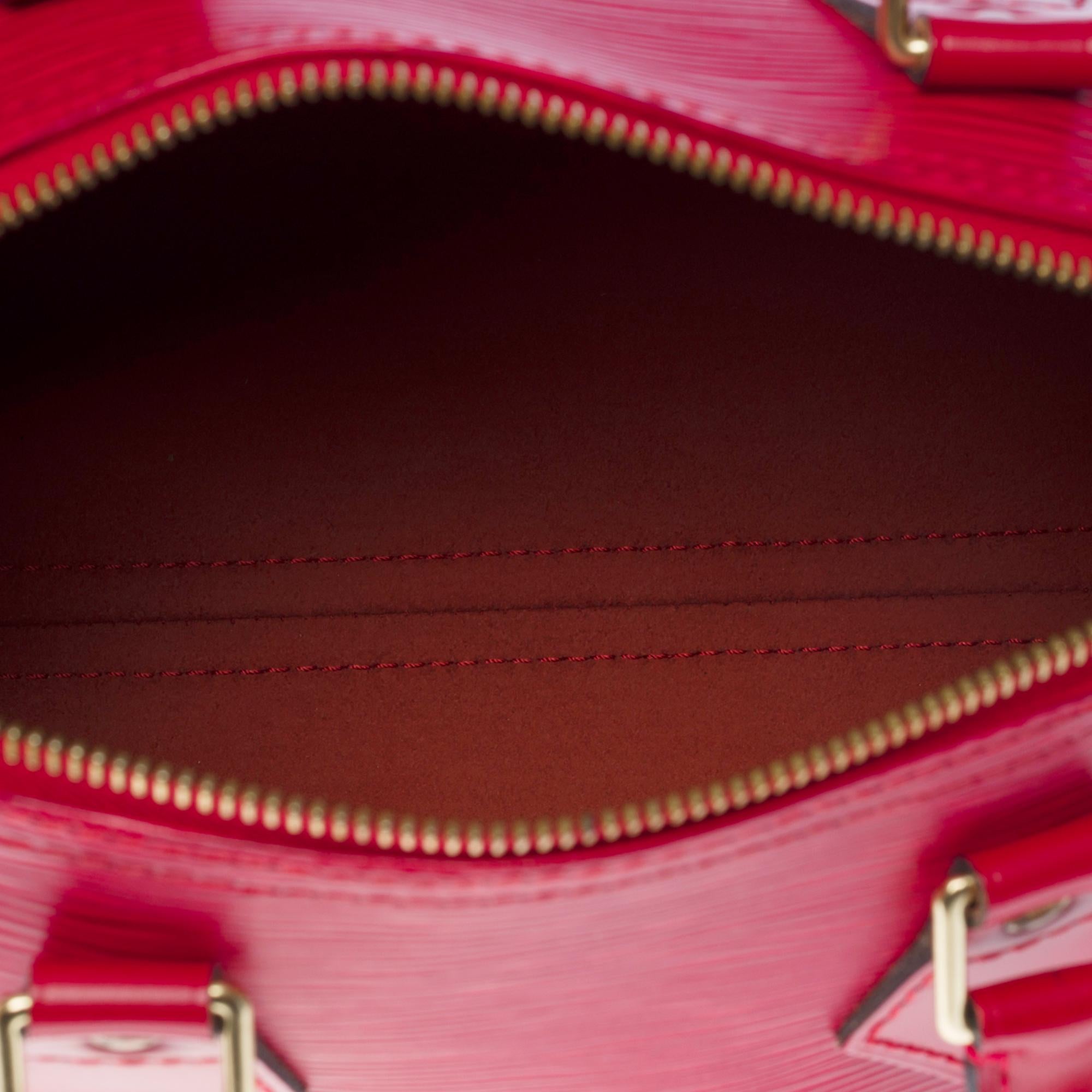 Magnifique sac à main Louis Vuitton Speedy 25 en cuir épi rouge et métal doré 3