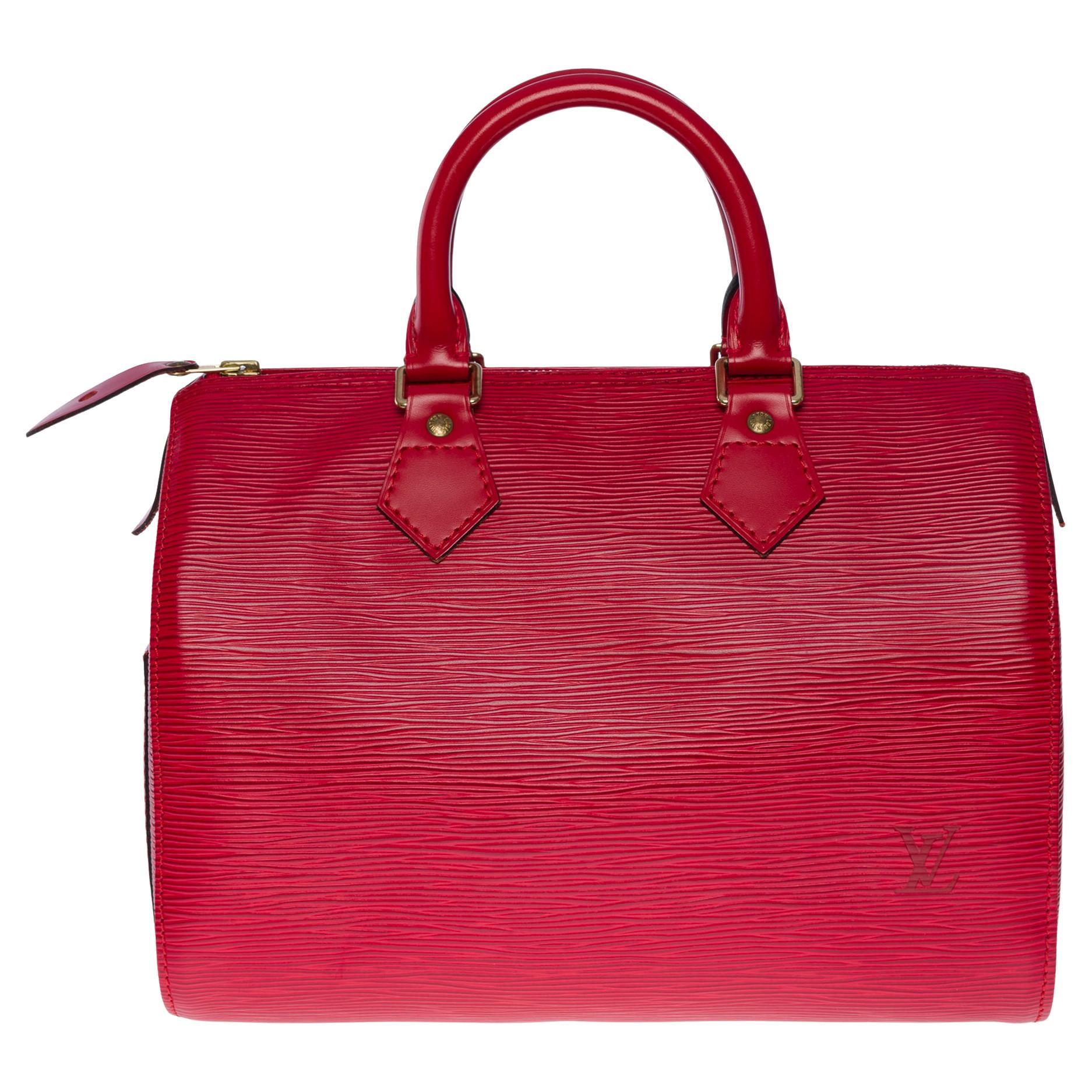 Magnifique sac à main Louis Vuitton Speedy 25 en cuir épi rouge et métal doré