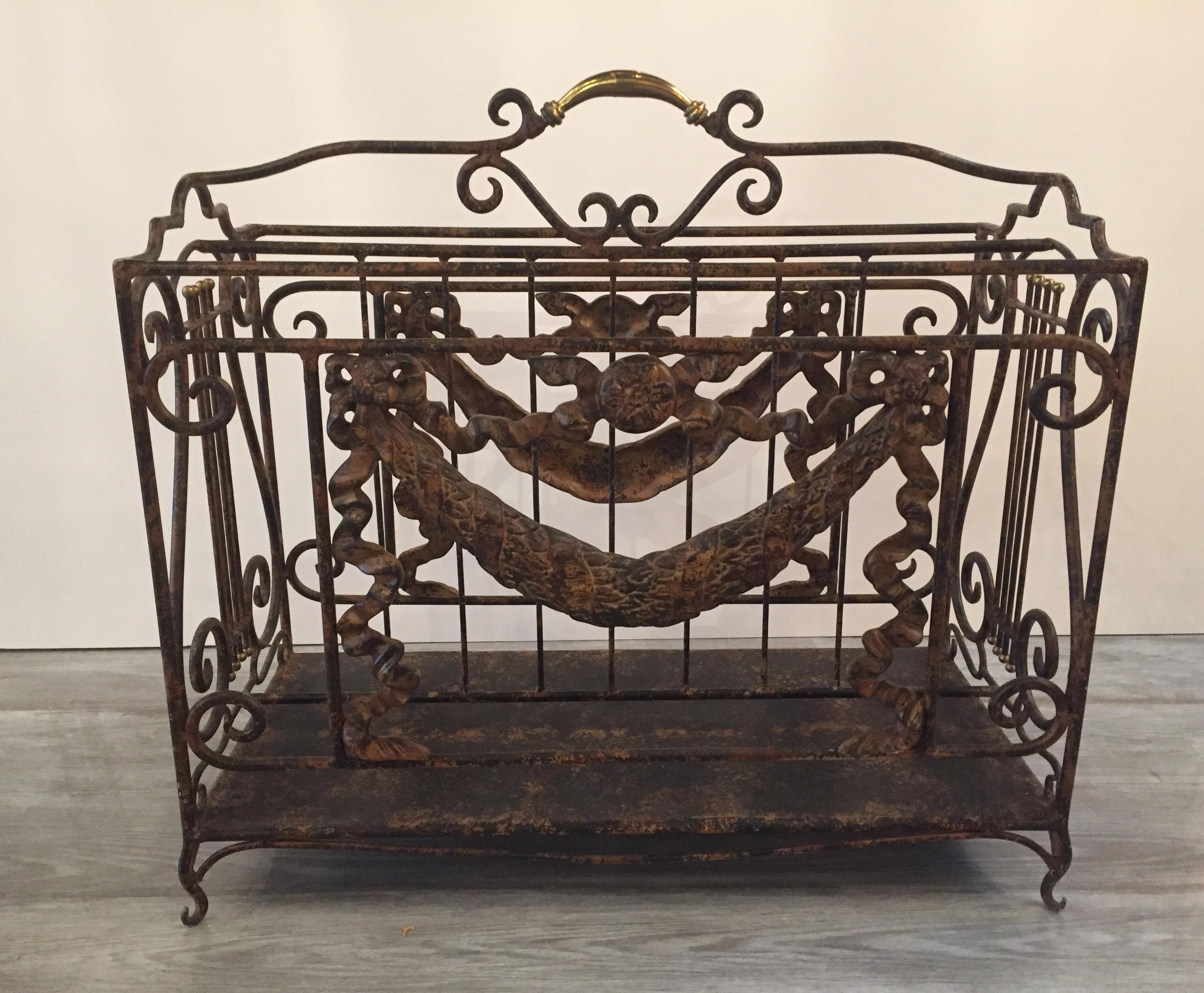 Beautifully crafted, heavy and substantial, neoclassical gilt iron Canterbury or magazine rack, having lovely lyres and laurel wreaths with gorgeous patinated coloration.

 