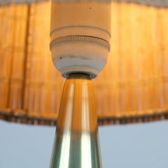 Splendida lampada da tavolo "a goccia" in ottone fuso di Mauri Almari Modello 61046 Idman, anni '50