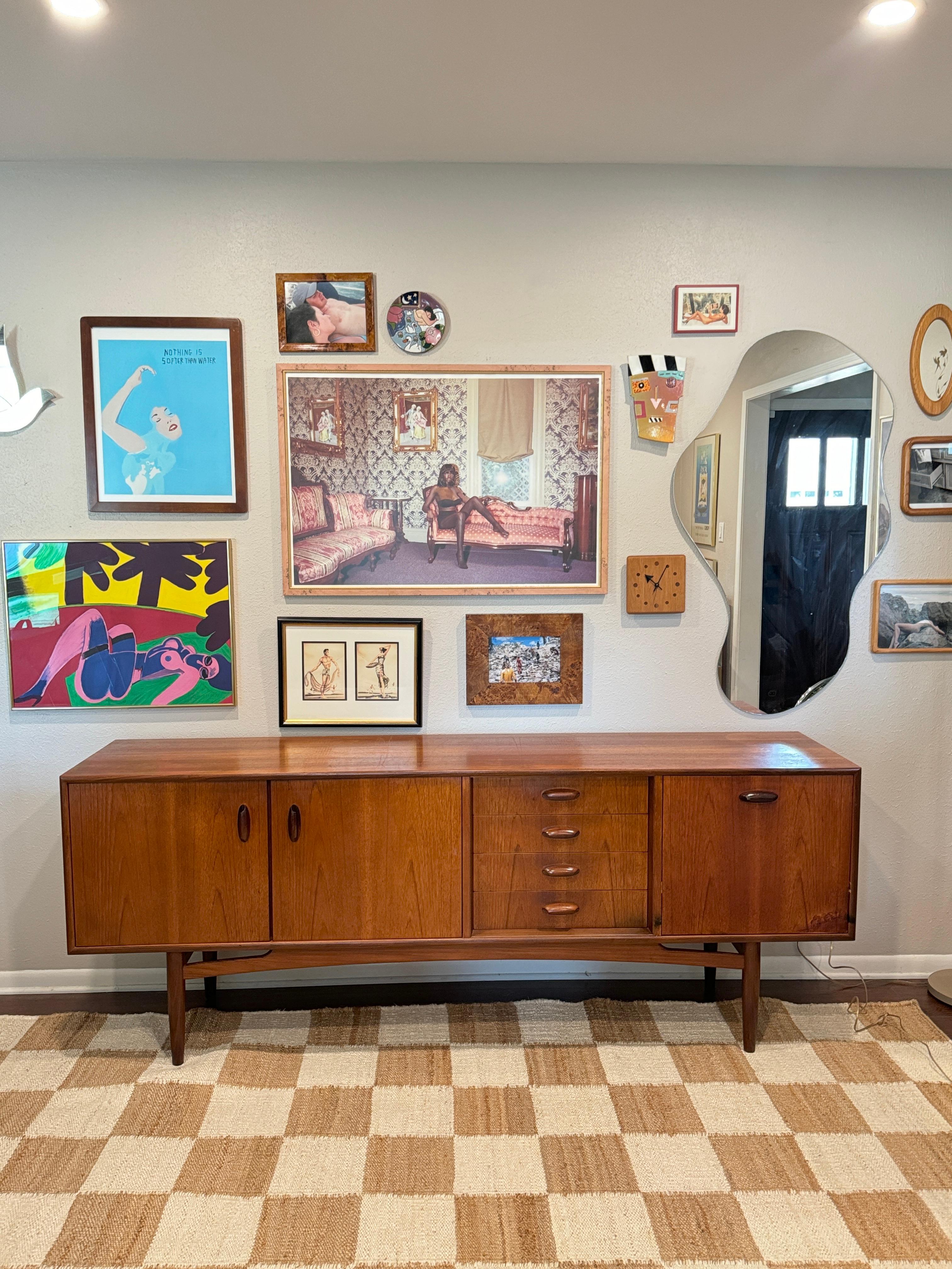 Gorgeous mid century modern large teak sideboard by G Plan, circa 1960s. Part of their Brasilia line. In good original condition, and structurally sound. All drawers open and close smoothly. There is a cosmetic flaw on the bottom right of the