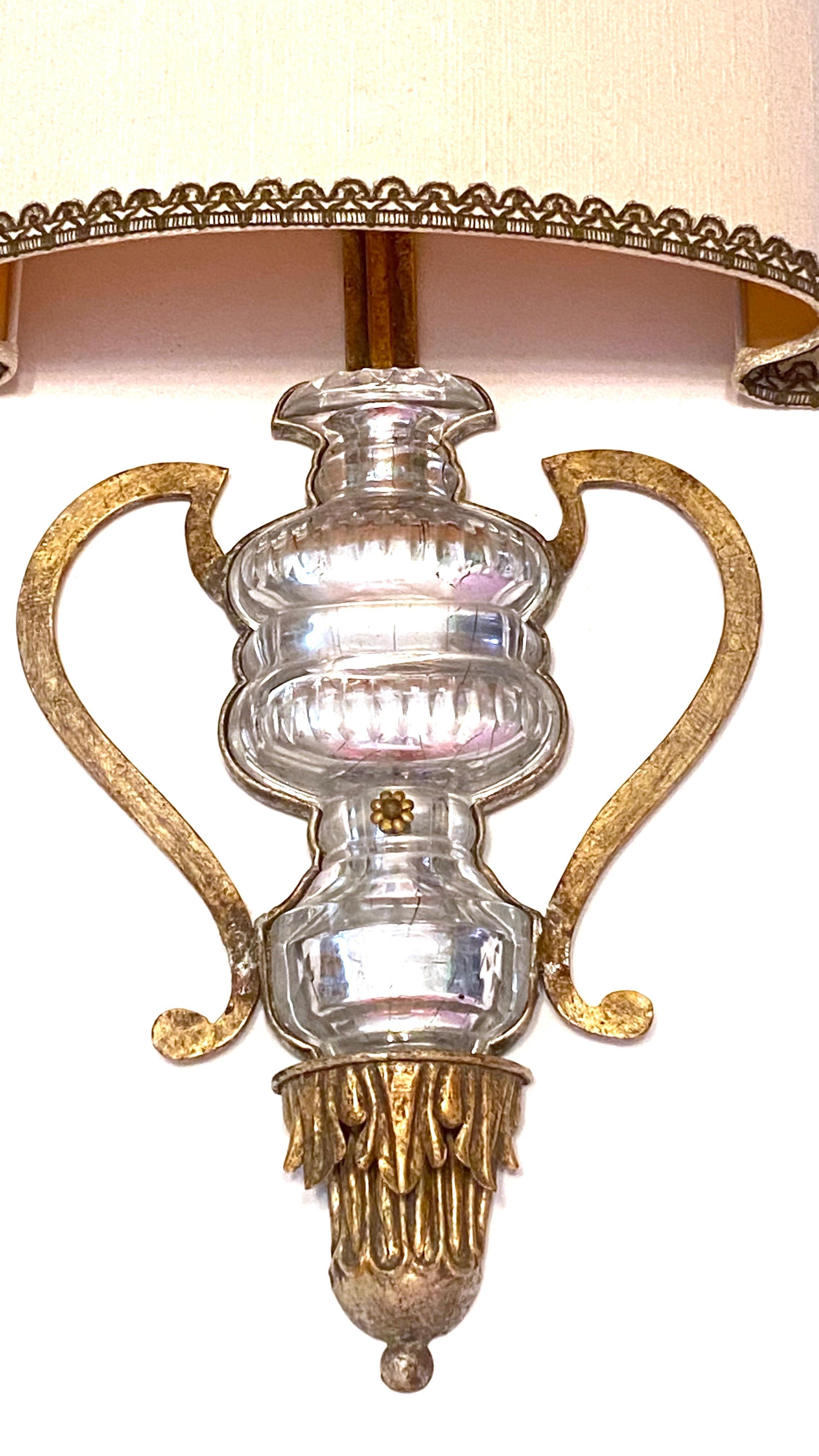 A single large sconce by Banci Firenze with crystal urn motif. The fixture requires two European E14 candelabra bulbs, each bulb up to 60 watts. The wall light has a beautiful patina and gives each room a eclectic statement. Made of metal and