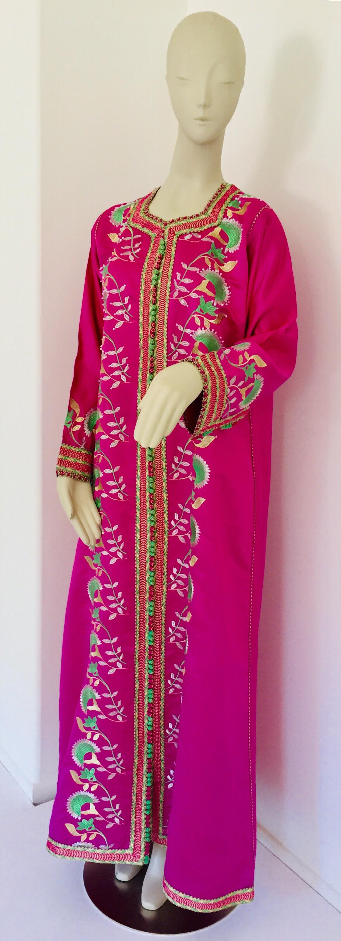 Elegant Moroccan caftan in hot pink fuchsia color with heavy embroideries.
This long maxi dress vintage kaftan is nicely embroidered and embellished.
Gorgeous Vintage hostess gown kaftan, circa 1980s.
Exotic oriental floral long maxi caftan dress