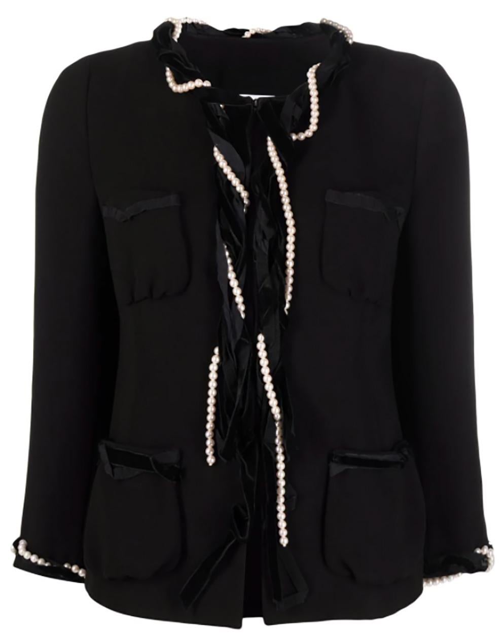 Gorgeous Moschino black pearl-embellished single-breasted jacket featuring grosgrain ribbon trim, a round neck, front hook and eye fastening, four front patch pockets and a straight hem.
In excellent vintage condition. Made in Italy.
Estimated size