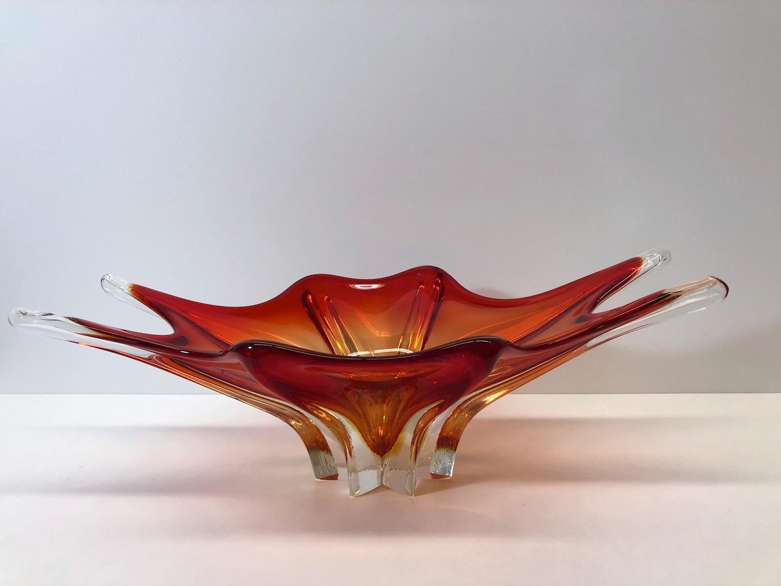 An amazing Venetian Murano glass bowl in a nice red and orange color. A highly decorative piece useful as centre piece or bowl, candy bowl or fruit bowl, Italy, 1960s.