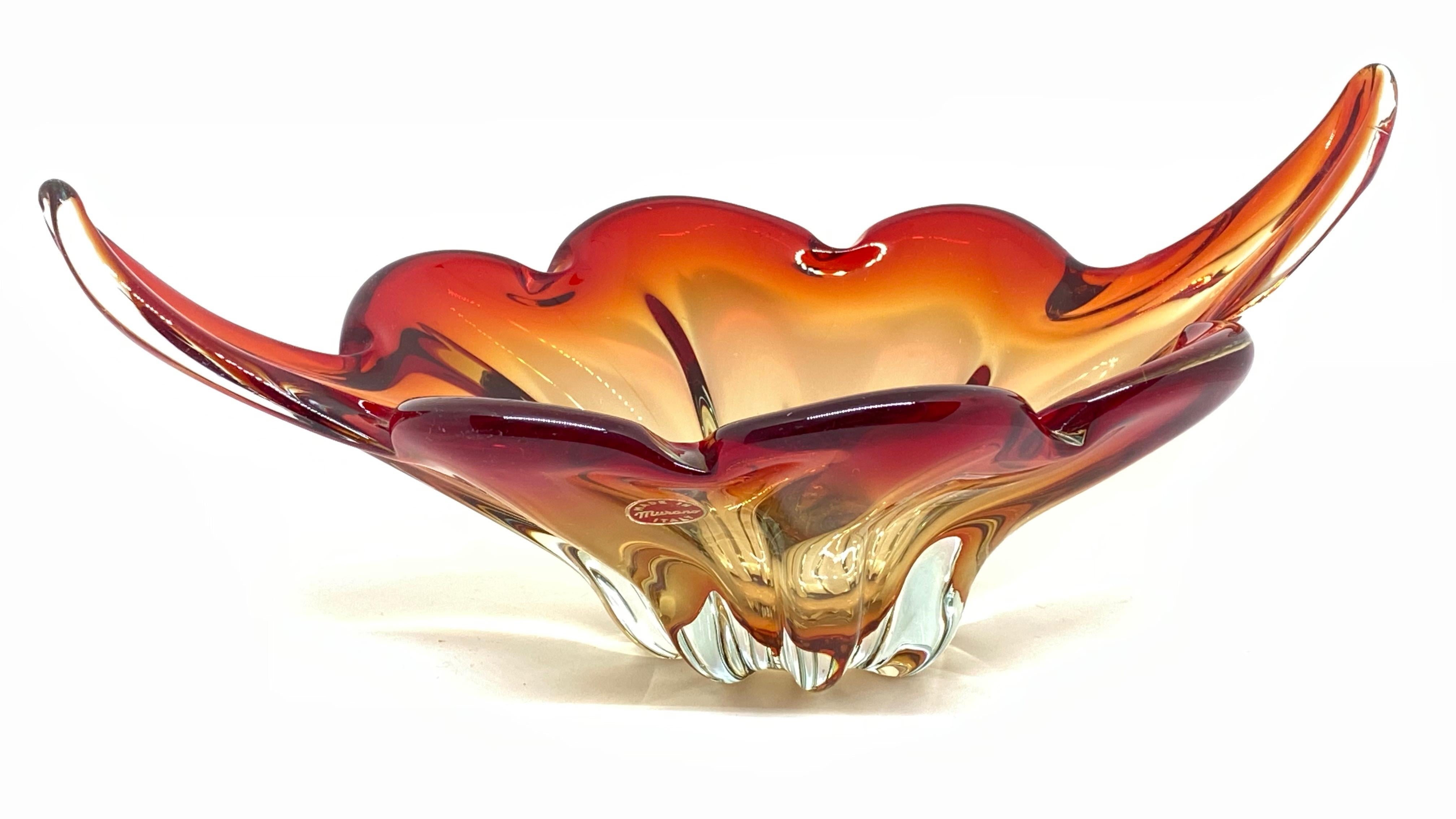 An amazing Venetian Murano glass bowl in a nice red, orange and clear color. A highly decorative piece useful as centre piece or catchall, candy bowl or fruit bowl, Italy, 1970s.