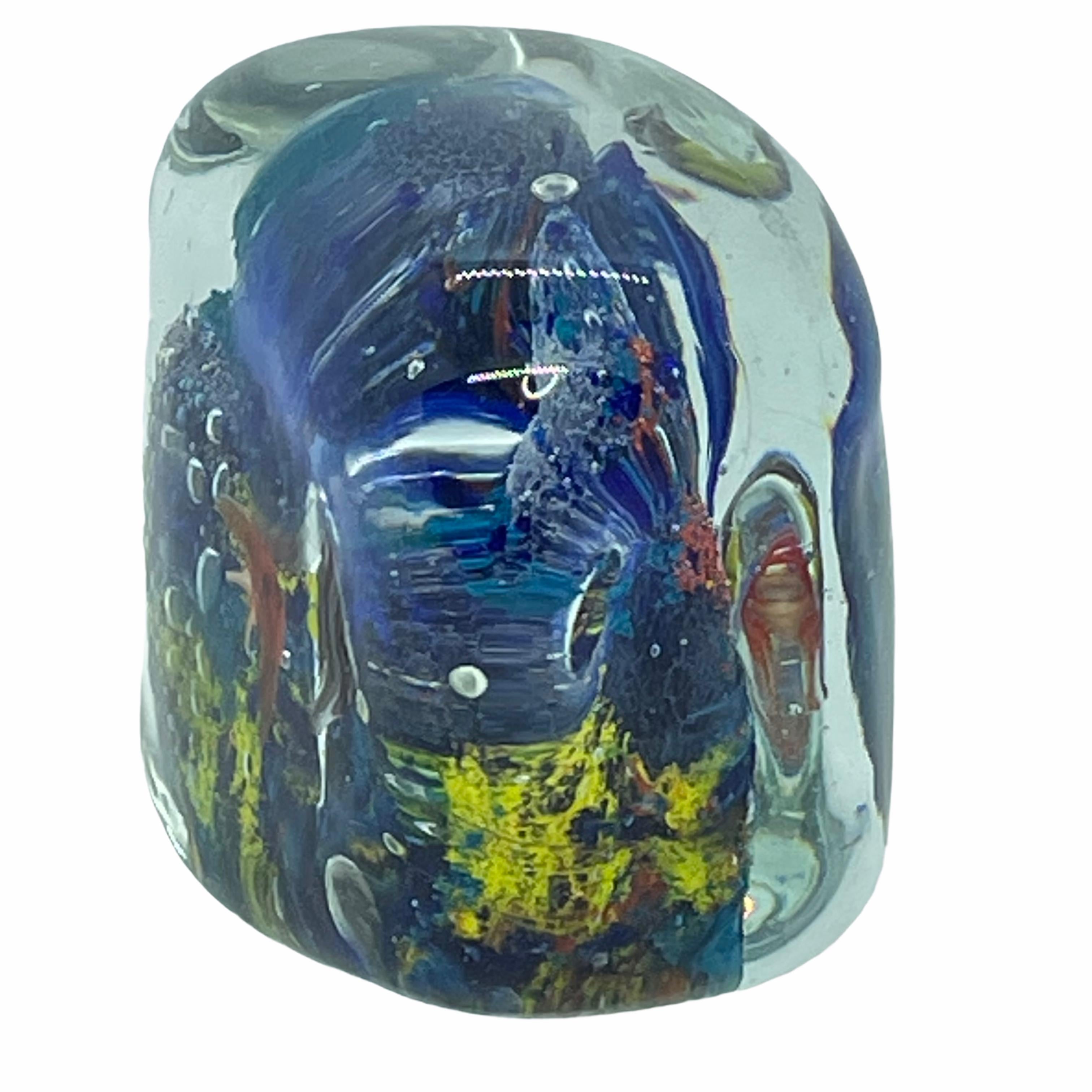 Beautiful Murano hand blown aquarium Italian art glass paper weight. Showing some multicolored fishes, floating on controlled bubbles. Colors are a blue, orange and clear. A beautiful nice addition to your desktop or as a decorative piece in every
