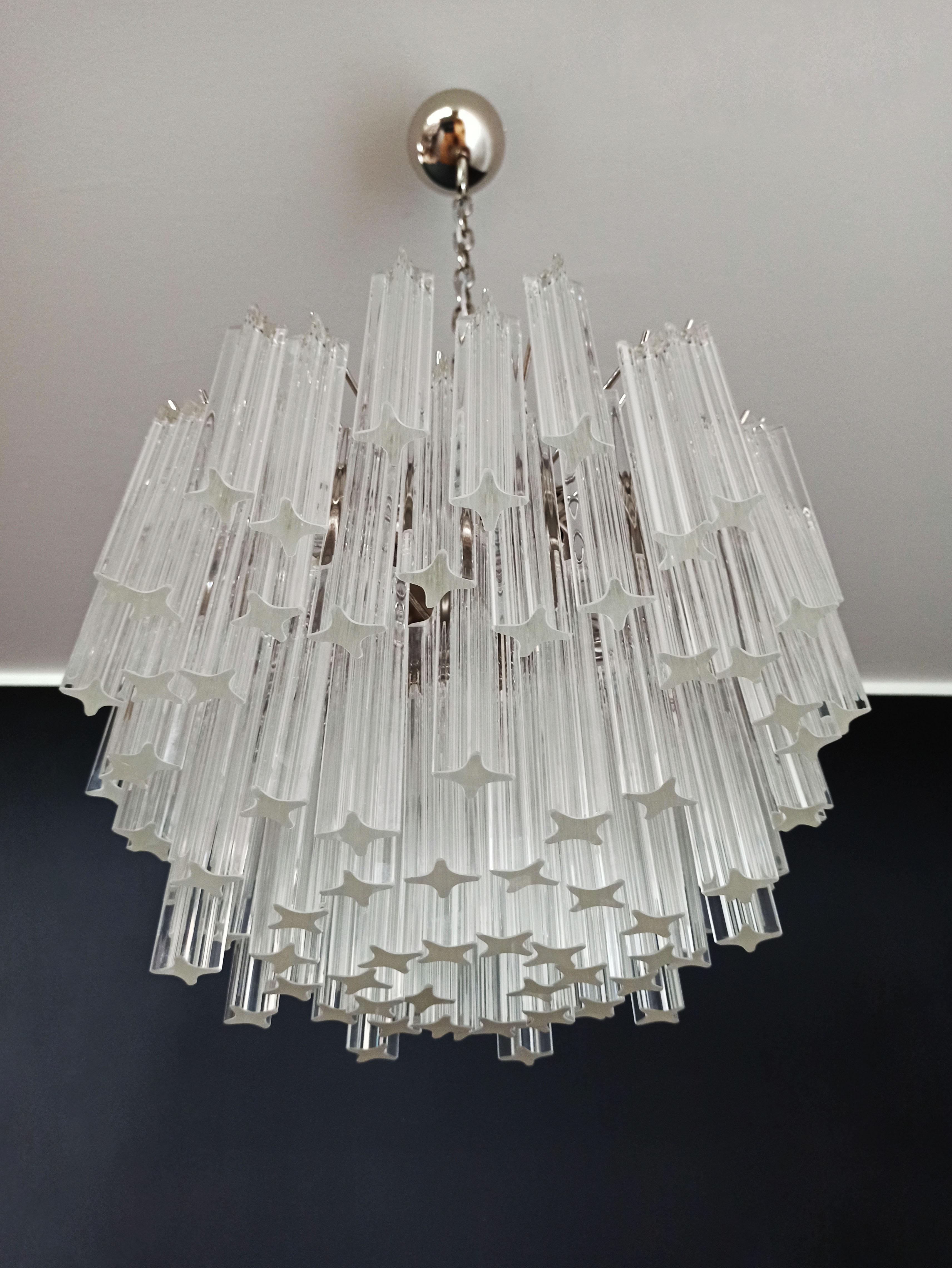 Fantastic vintage Murano chandelier made by 107 Murano crystal prism quadriedri in a nickel metal frame.

Period: 1980s

Dimensions: 45.25 inches height (115 cm) with chain; 15.75 inches height (40 cm) without chain; 17.70 inches diameter (45