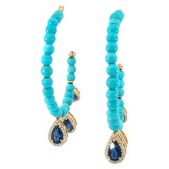 Superbes boucles d'oreilles en turquoise naturelle, saphirs et diamants