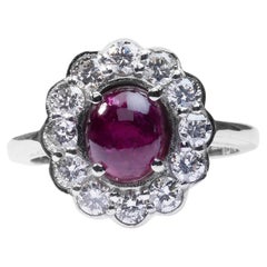 Gorgeous Oval Halo Ring with 2.66 Natural Ruby and Diamonds- IGI Certificate