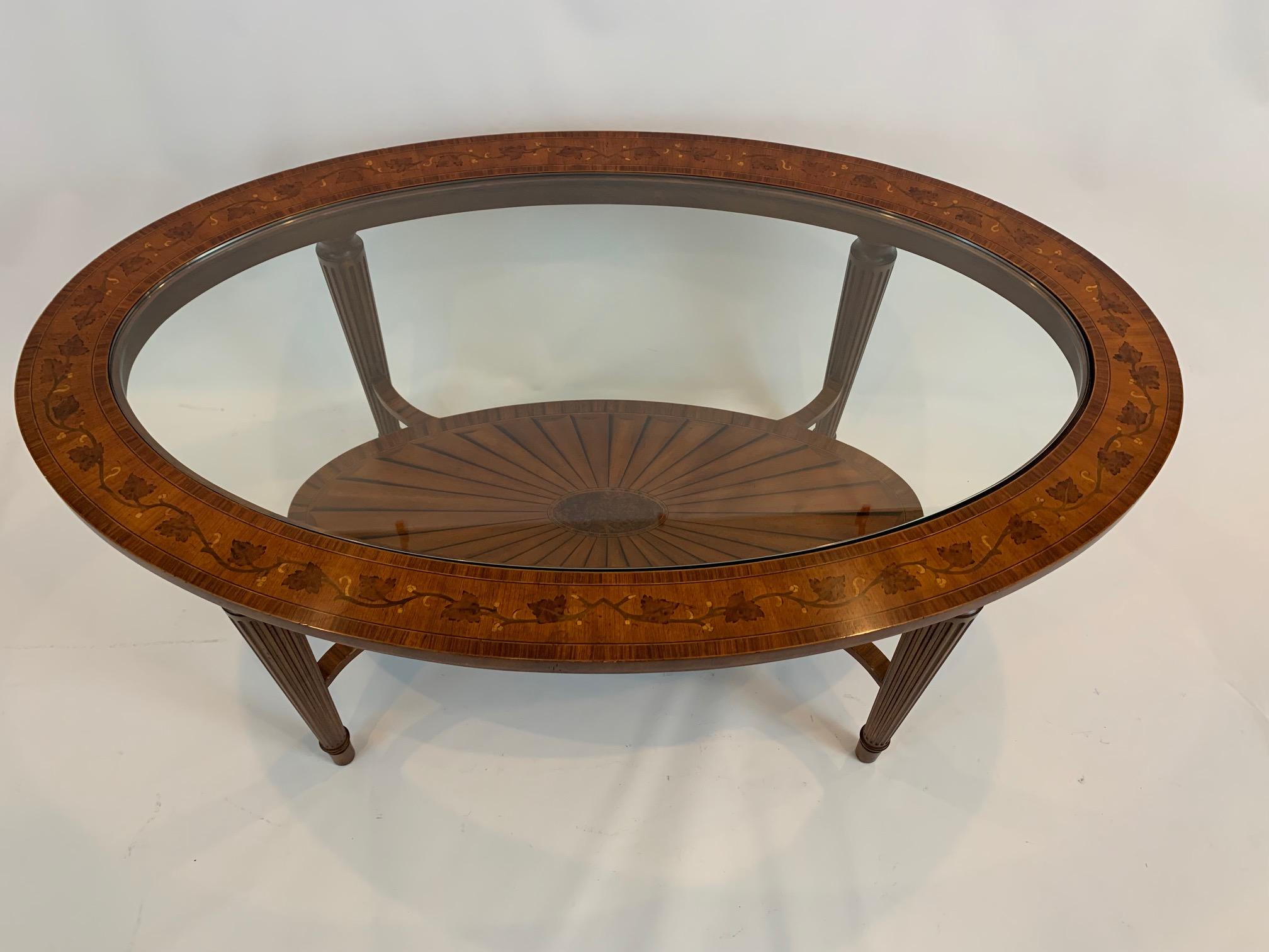 oval wood and glass coffee table