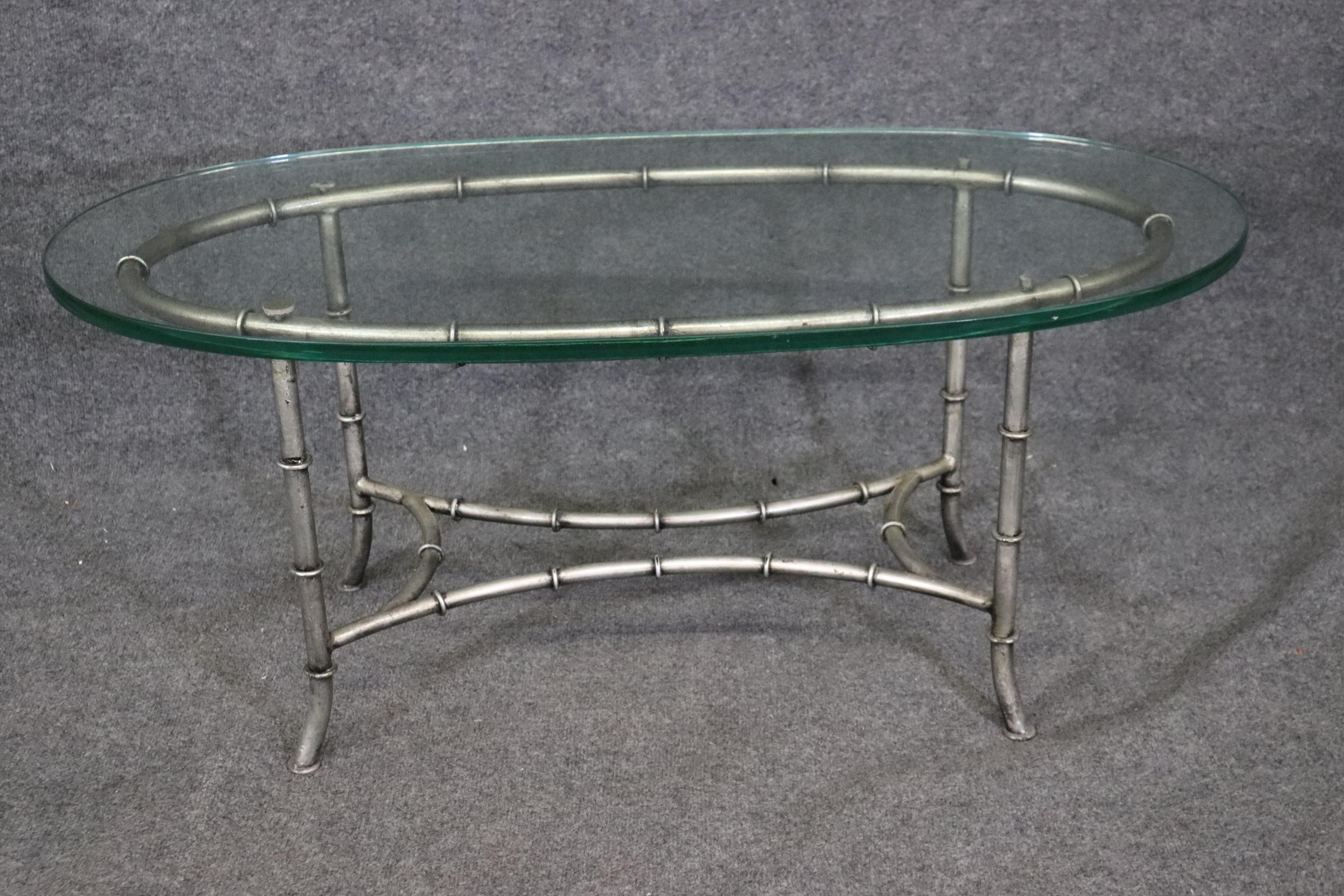 Gorgeous Oval Steel and Glass Maison Bagues Style Faux Bamboo Coffee Table In Good Condition For Sale In Swedesboro, NJ