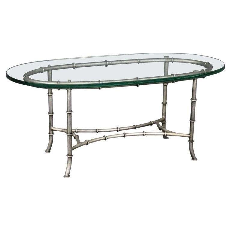 Gorgeous Oval Steel and Glass Maison Bagues Style Faux Bamboo Coffee Table For Sale