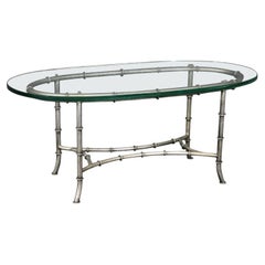 Magnifique table basse ovale en acier et verre style Maison Bagues en faux bambou
