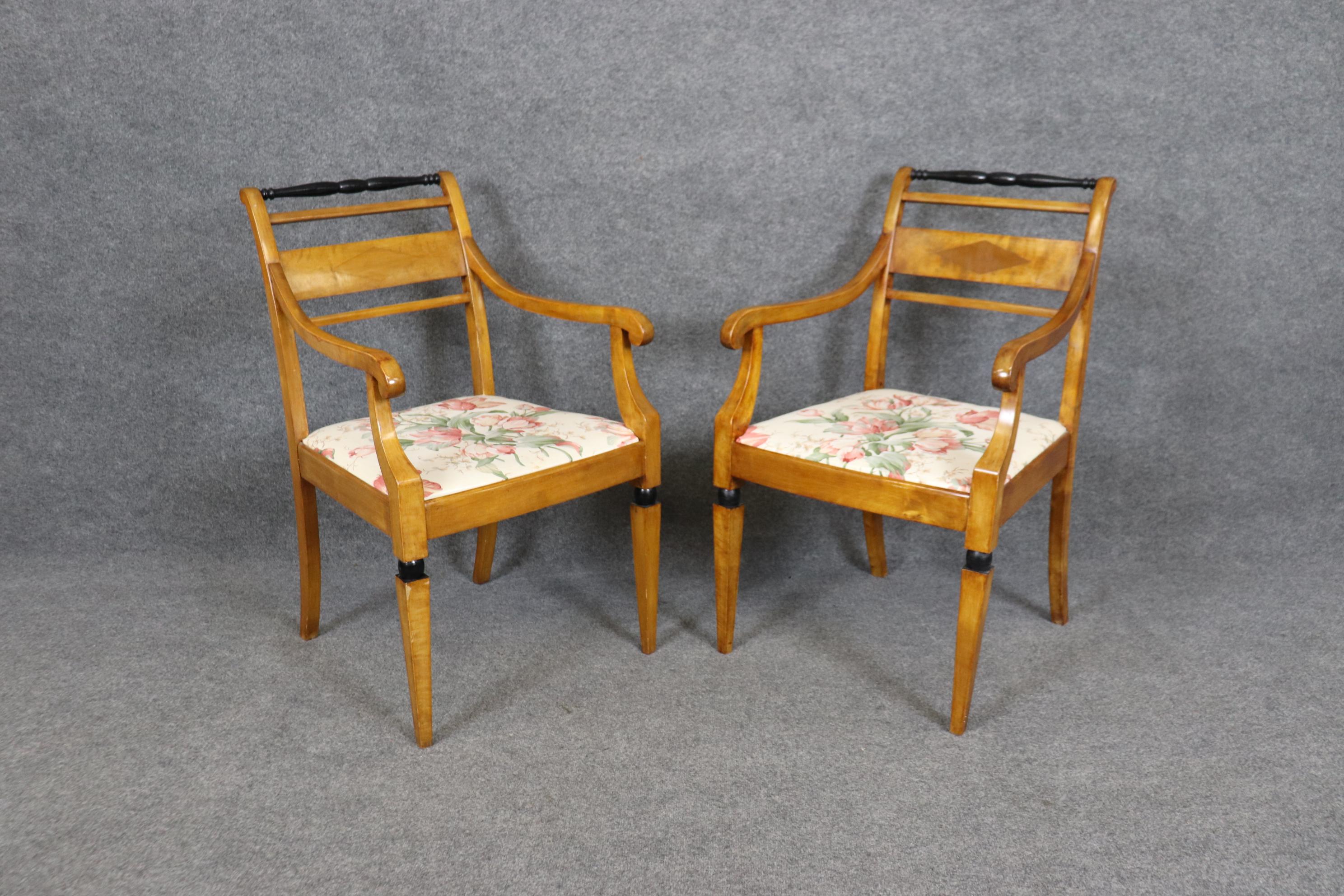 This is a beautiful pair of Biedermeier style chairs made during the 1900-1920s era with ebonized accents. The chairs will show signs of wear and use such as chips, nicks, and Scuffs to the frames. Measures 36.5 tall x 22.5 wide x 24 deep and seat