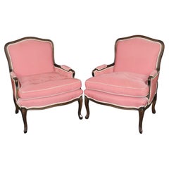 Gorgeous Pair Carved Walnut Louis XV Style Bergères with Pink Off-White Fabric