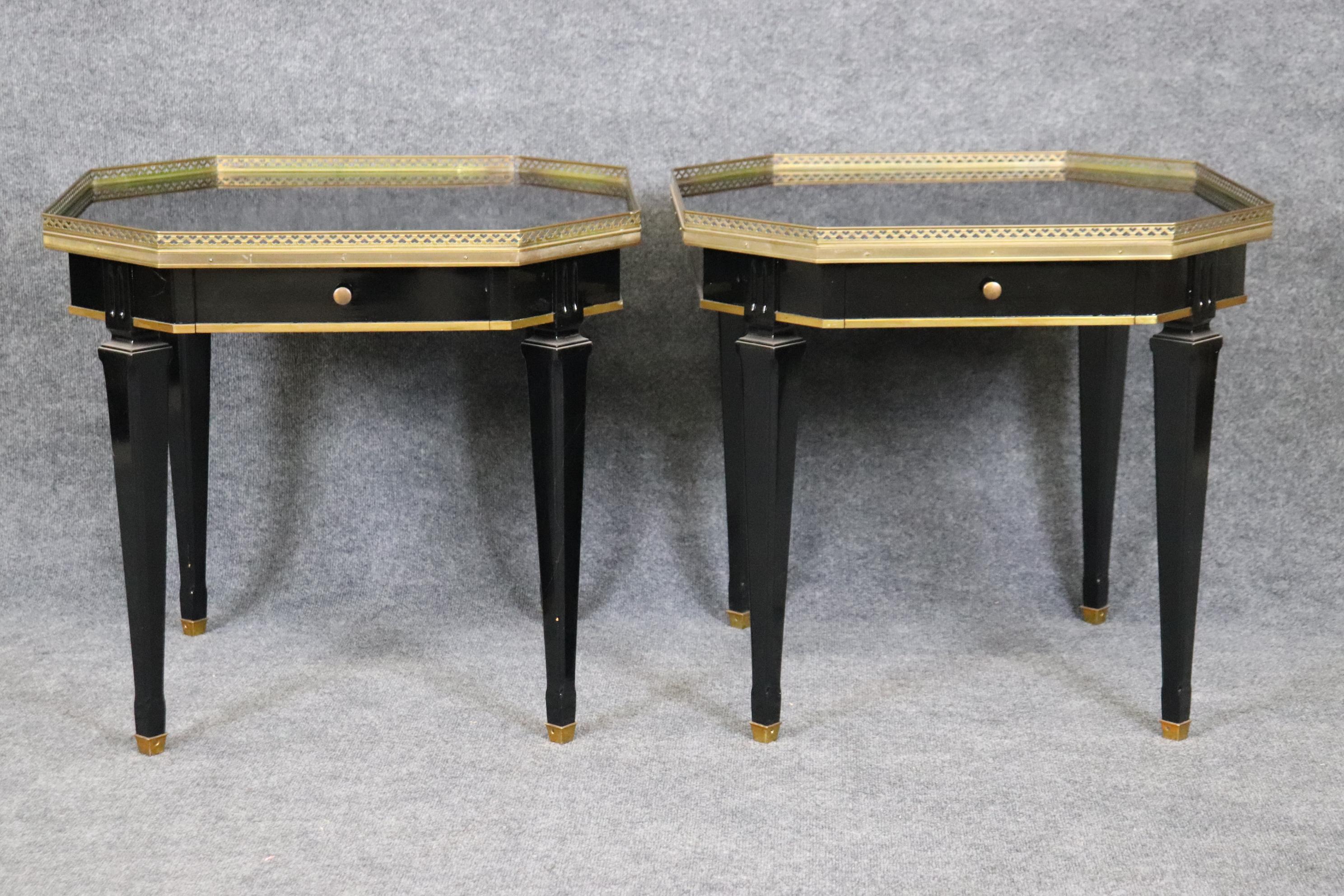 These are gorgeous recently black lacquered Maison Jansen style tables in the manner of Directoire. The tables ae in good condition and have minimal signs of age and use. The quality of the tables are impressive as is the bass and gold giltwood