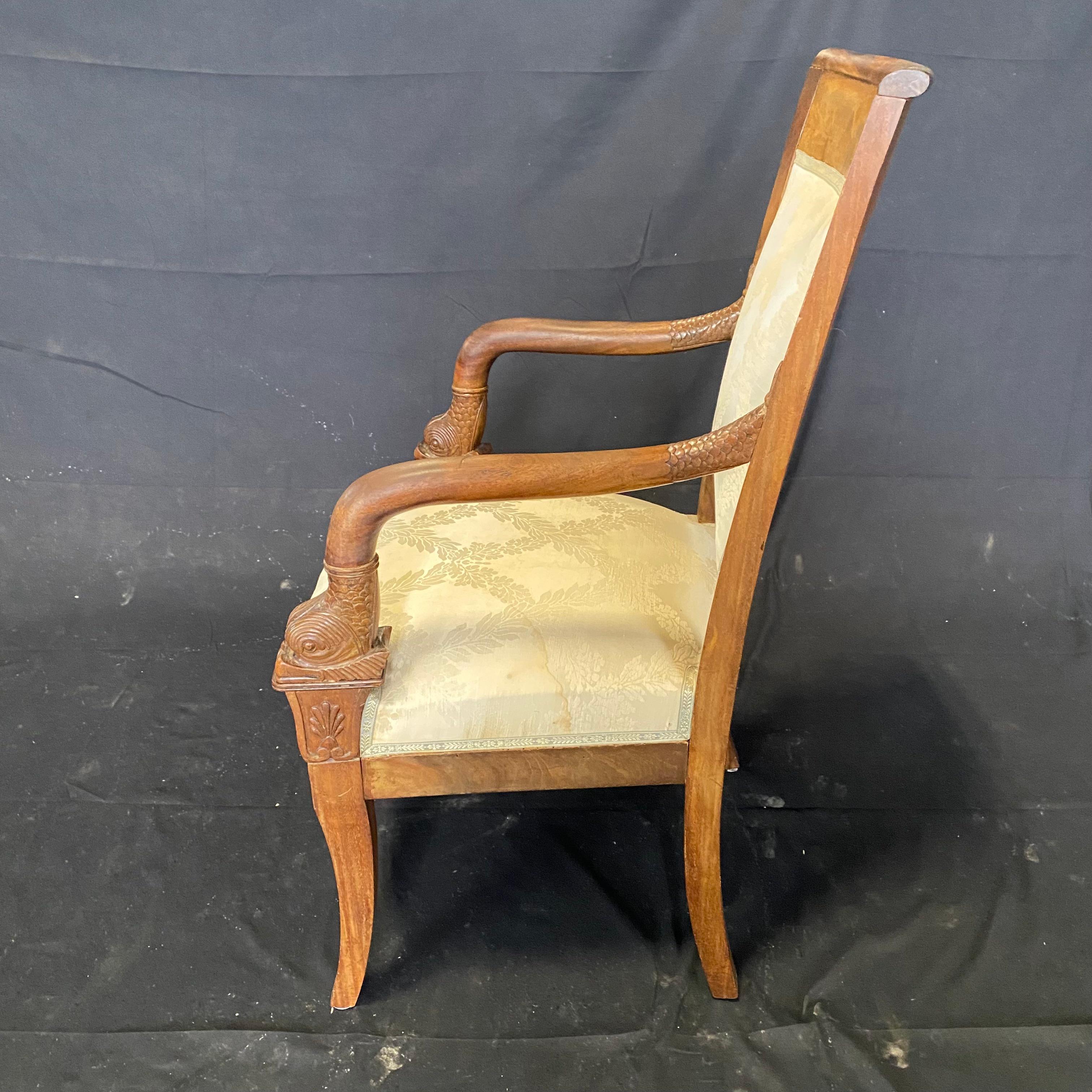 Upholstery Gorgeous Pair of French Empire Carved Walnut Armchairs with Dolphin Armrests For Sale