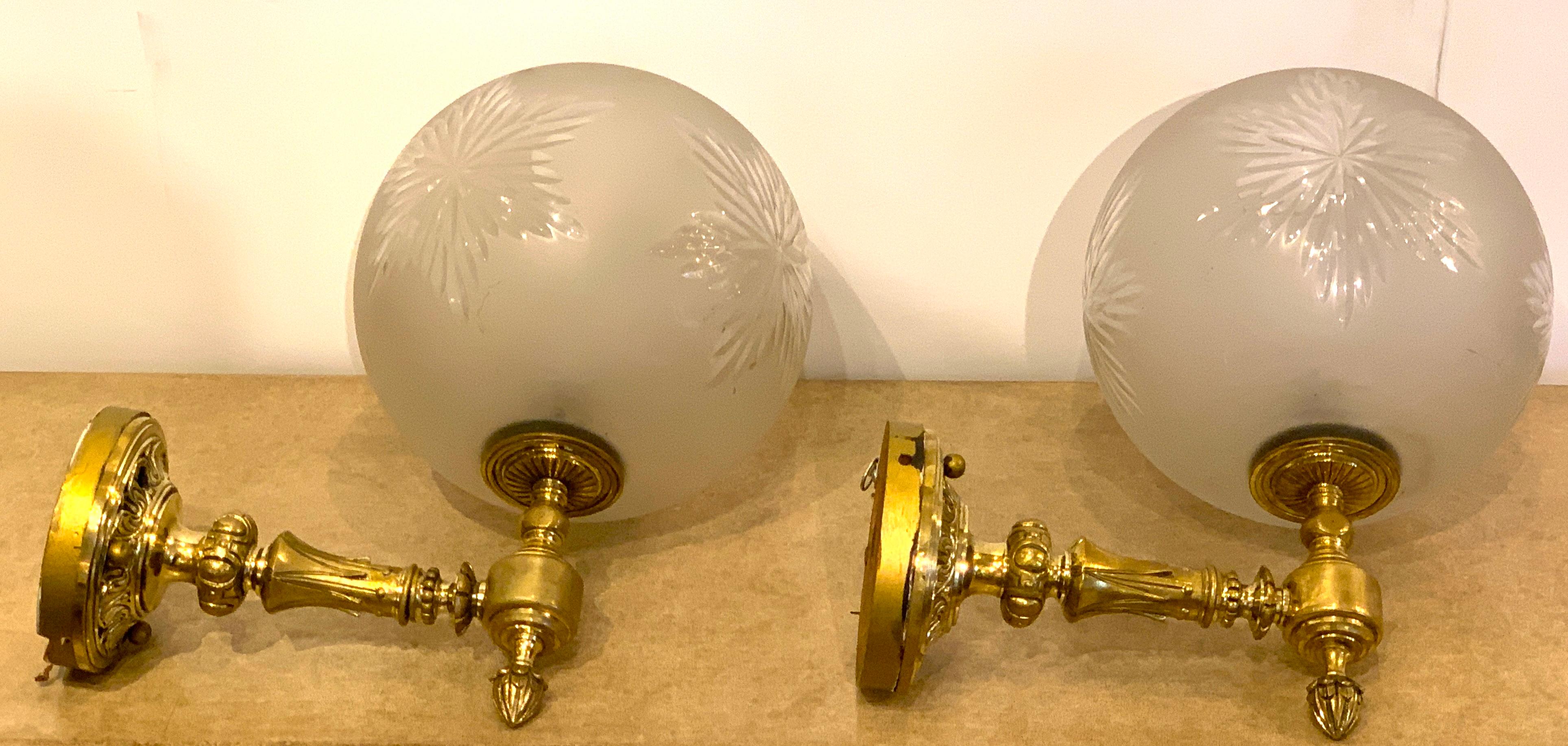 Gorgeous pair of high Victorian brass and engraved glass gas wall sconces, circa 1875
Each one with finely cast brass single arm holding an impressive 10