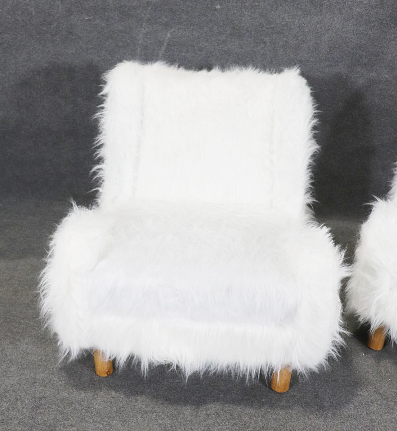 European Gorgeous Pair of Low Slung Faux Fur Chairs with Oak Frames Manner Jean Royere  For Sale