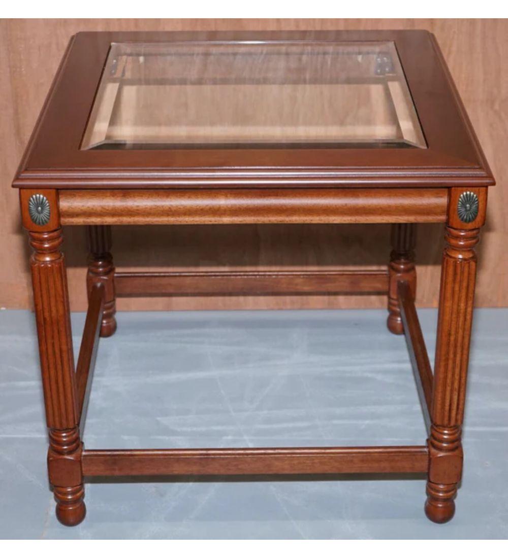 We are delighted to offer for sale this Regency style pair of end tables with glass top.

A very well-made and lovely set to add to your home.

Average age-related patina marks from fair use. We have lightly restored this by cleaning it, waxing