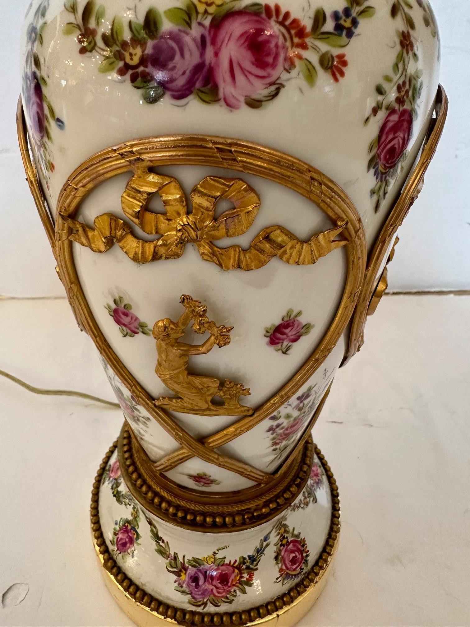 Mid-20th Century Gorgeous Pair of Vintage Porcelain Painted Table Lamps with Brass Overlays For Sale