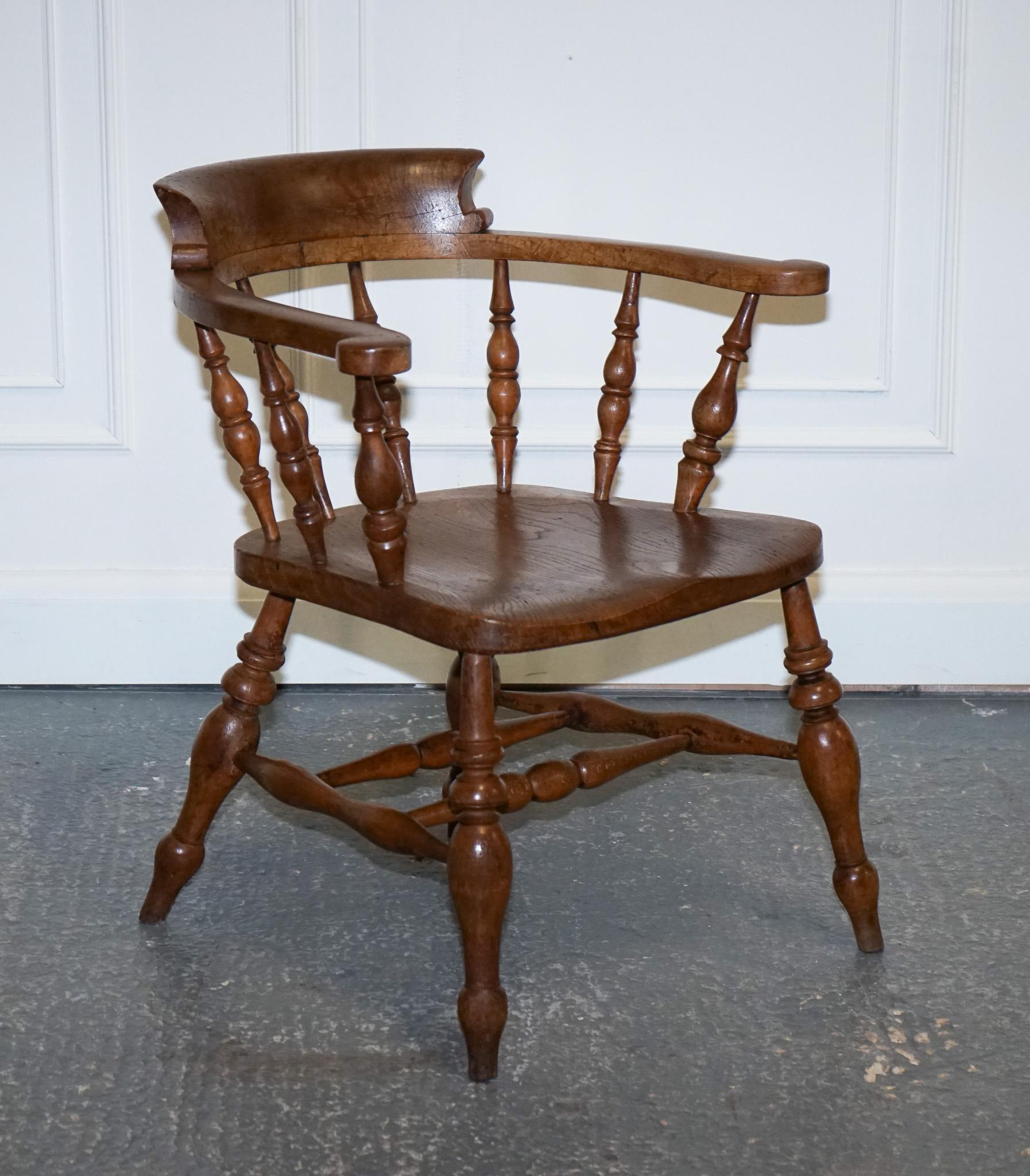 
We are delighted to offer for sale this Gorgeous Elm Smokers Captains Armchair.

This Edwardian solid elm bow back smokers captain's chair is truly stunning, with a gorgeous patina that radiates warmth and character. The chair features a