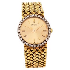 Gorgeous Piaget Yellow Gold Diamond and Gold Dial Ladies Wristrist Watch (Montre-bracelet pour dames en or jaune avec diamants et cadran en or)